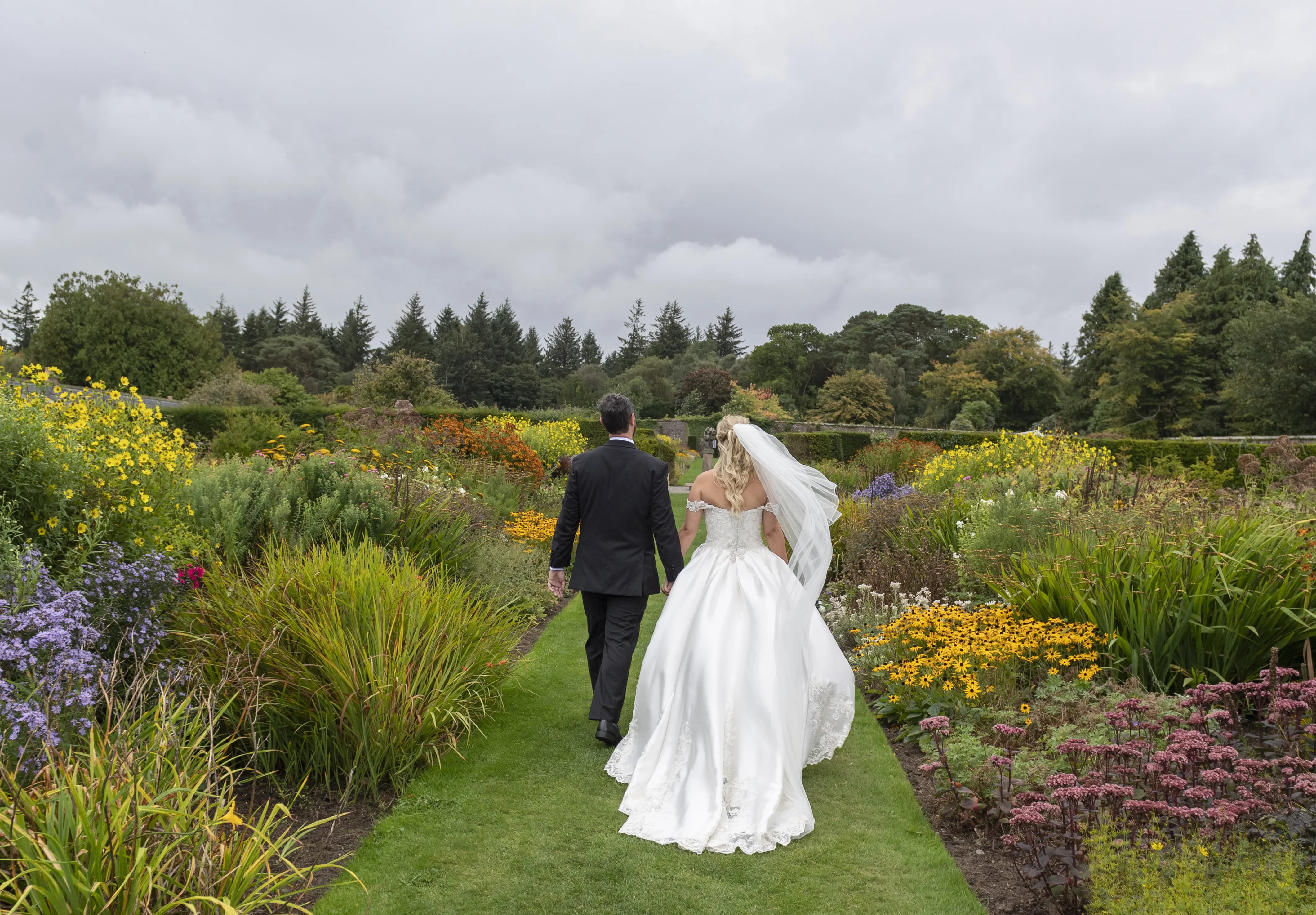 Bride In Satin Wedding Dress Called Kimora By Sottero And Midgley With Groom