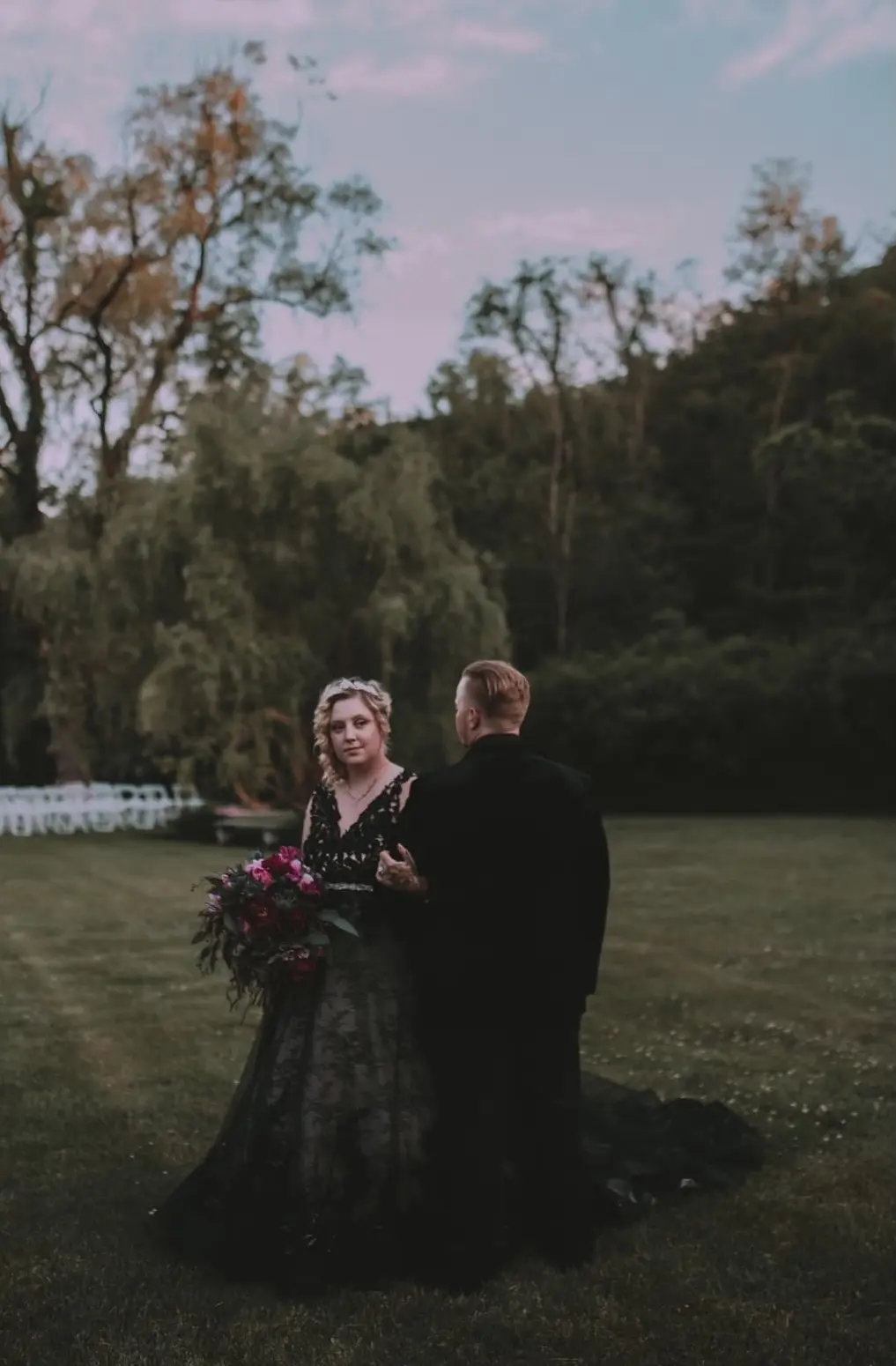 Groom With Bride Wearing Black Lace Ball Gown Zander By Sottero and Midgley