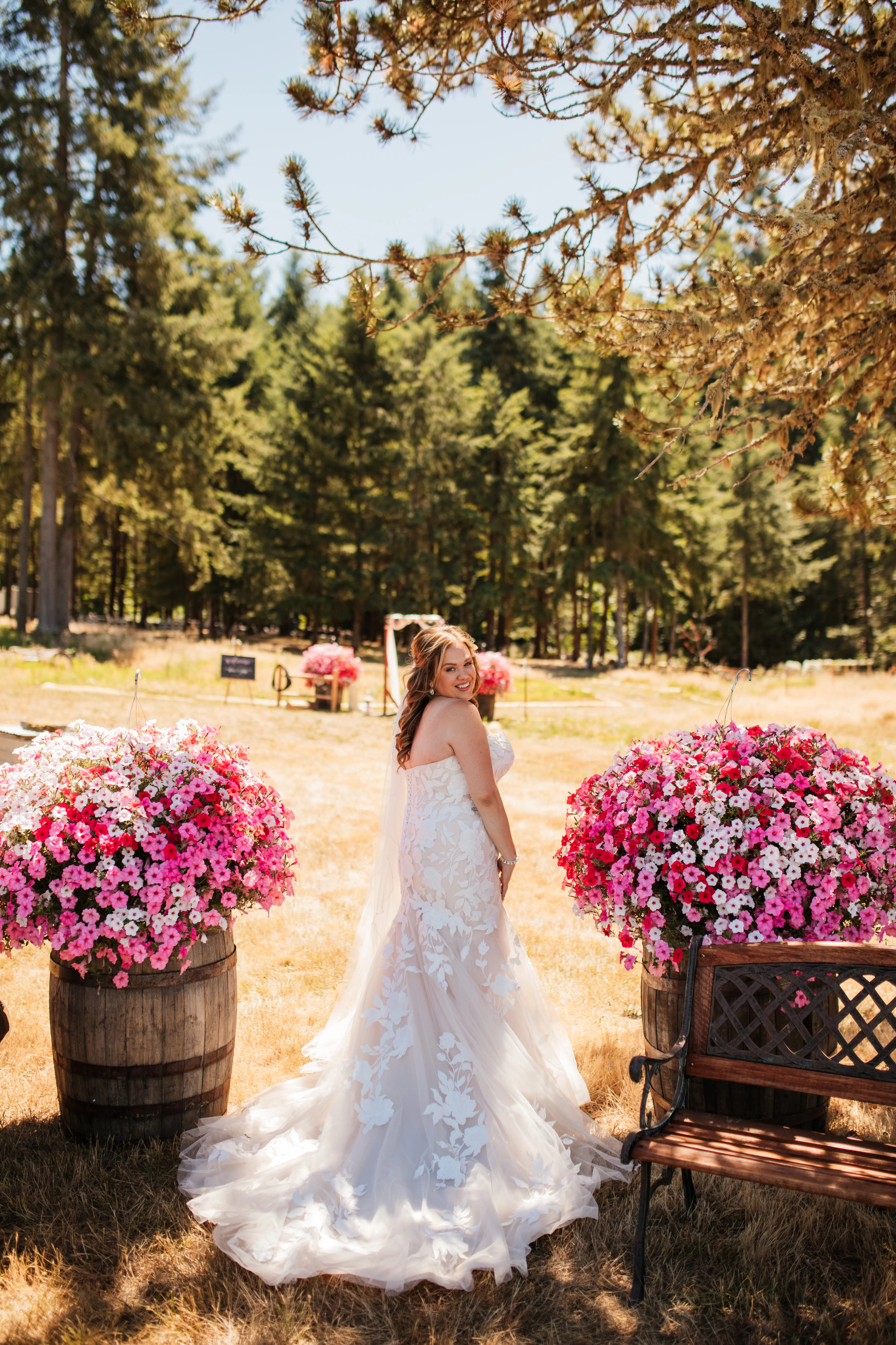 Bride wearing Hattie wedding dress by Rebecca Ingram showing off train
