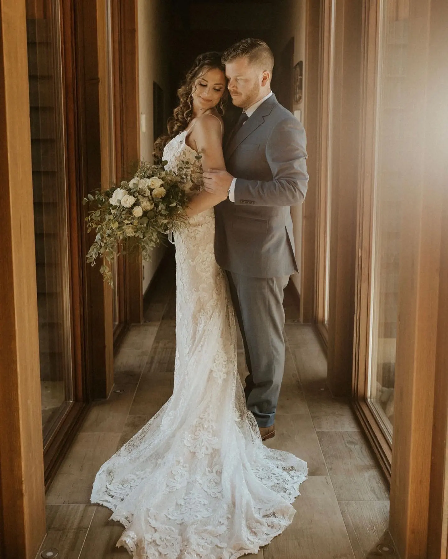 Groom With Bride Wearing Lace Sheath Wedding Dress Tuscany Lynette By Maggie Sottero