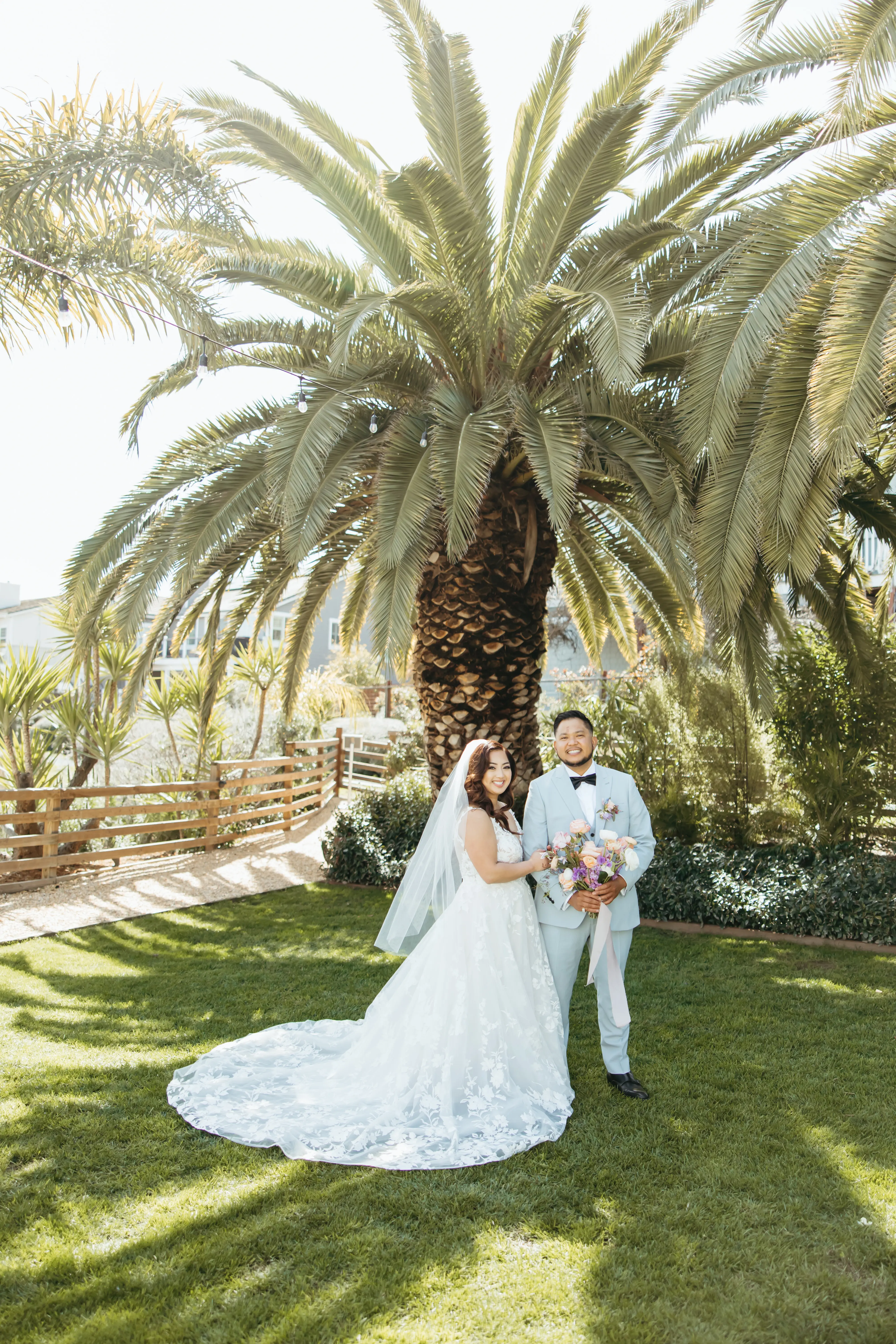 Groom with Bride in Whimsical Lace A-Line Wedding Gown with Deep Scoop Back Called Winter by Maggie Sottero