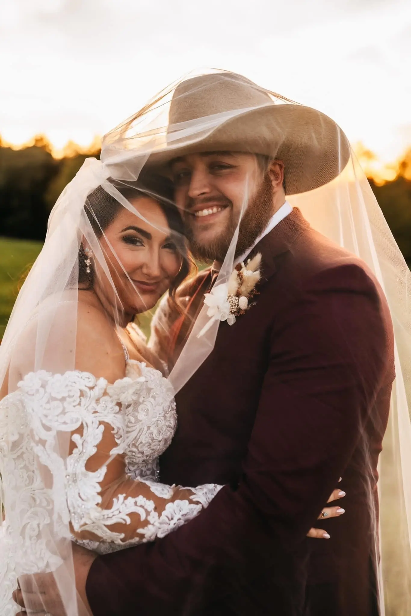 Bride wearing Fiona by Maggie Sottero with her husband