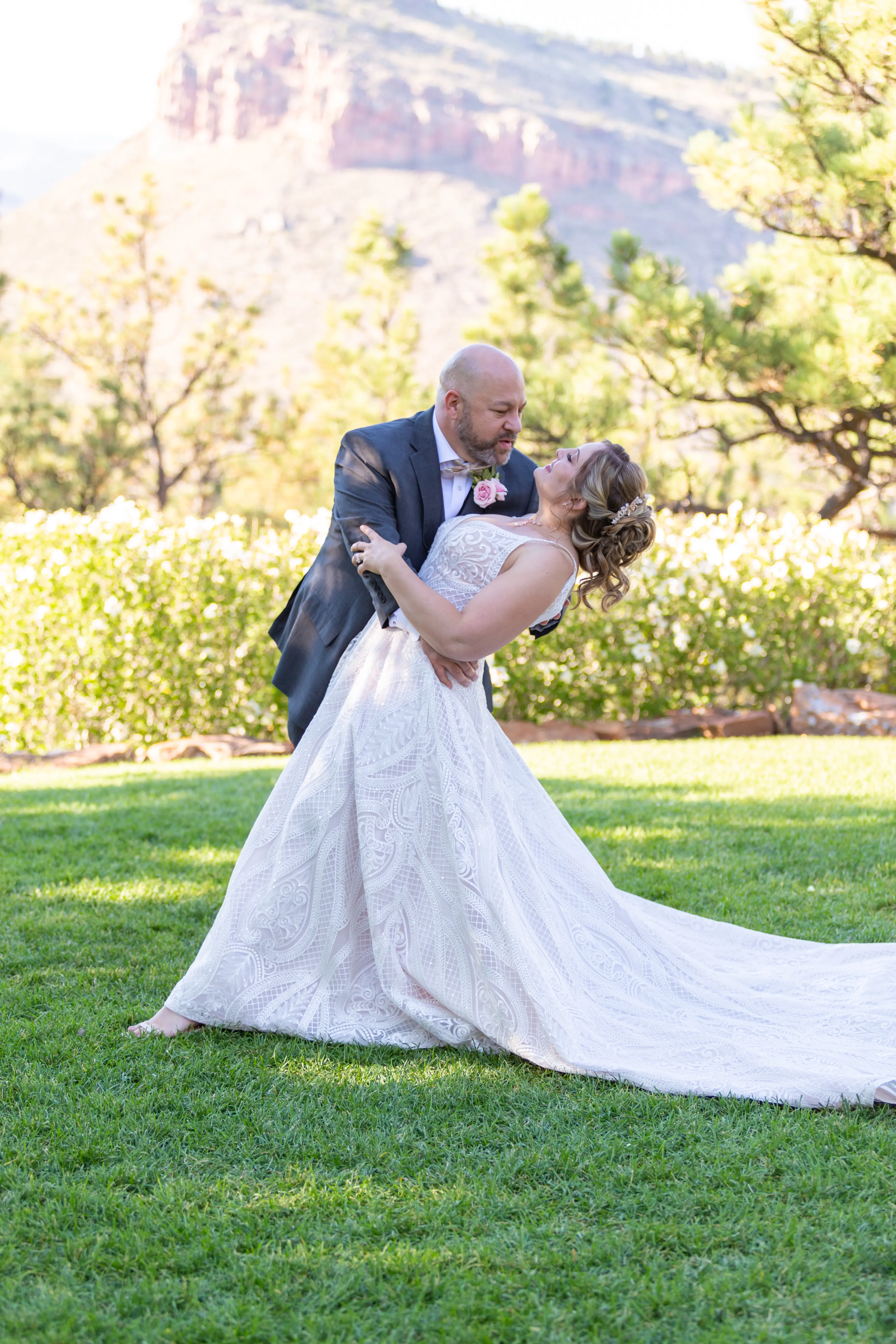 Groom With Bride Wearing Boho Princess A-Line Wedding Dress Roxanne By Sottero And Midgley