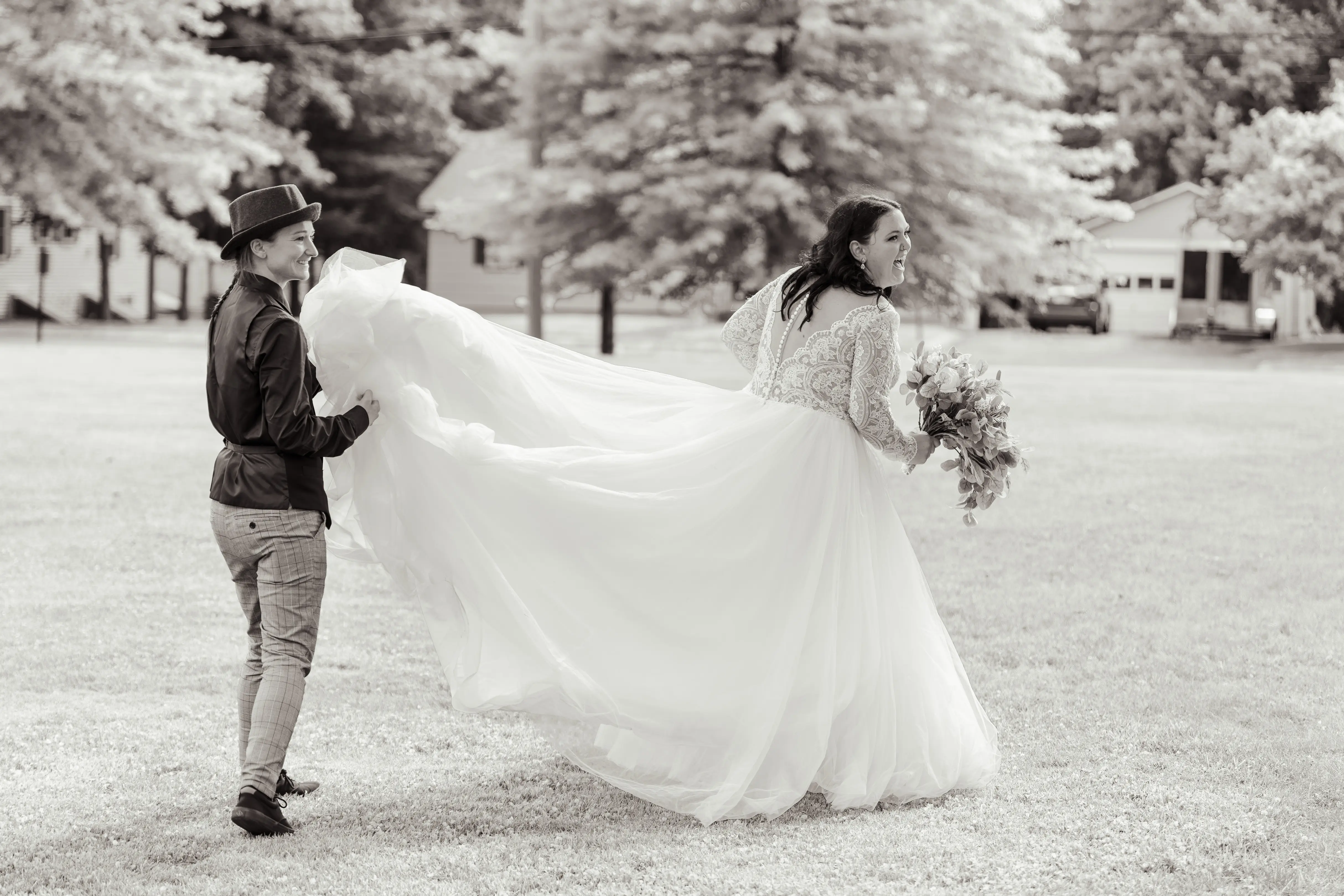 Real Bride in V-neckline, Tulle Skirt Wedding Dress Named Mallory Dawn by Maggie Sottero with Groom