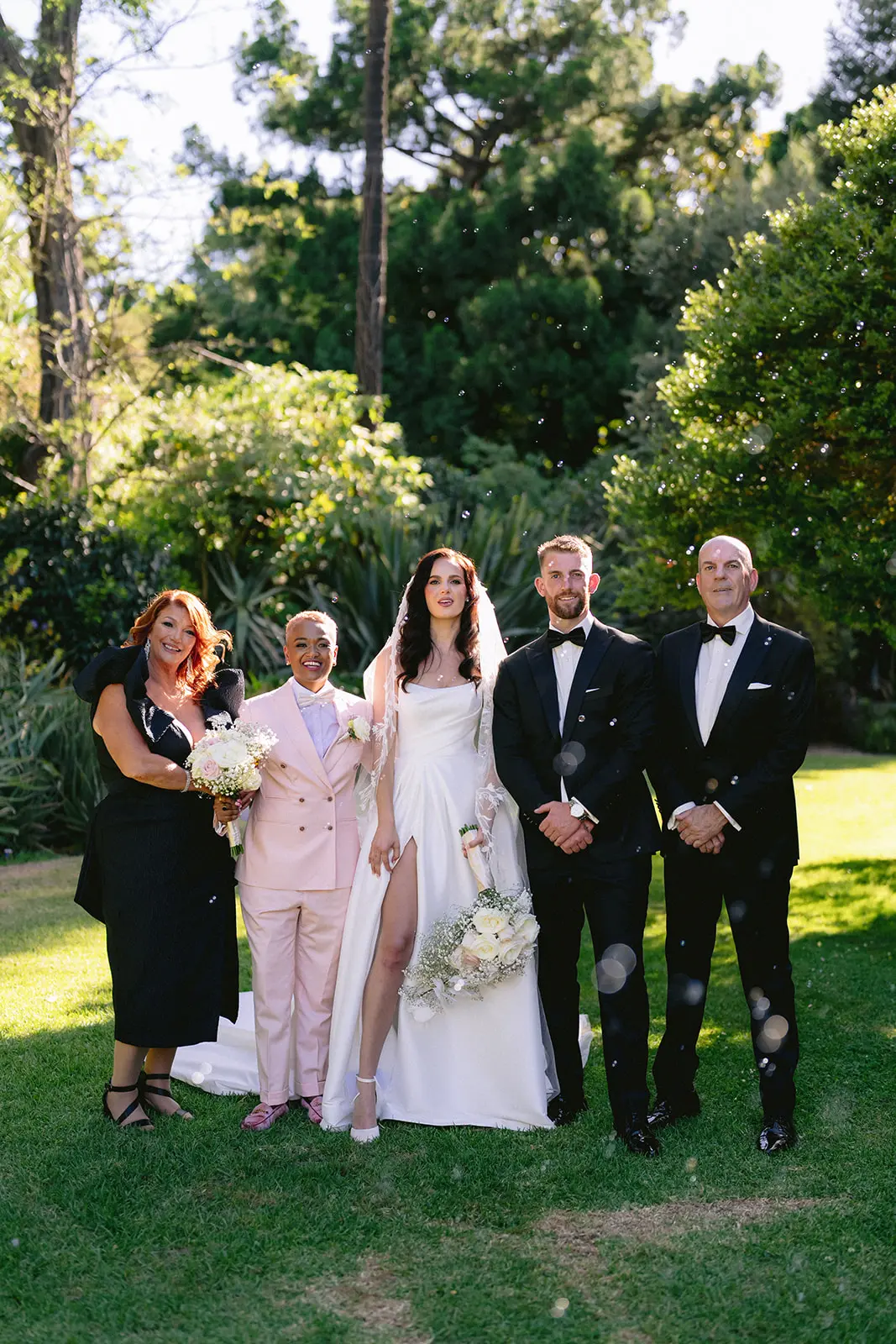 Bride wearing Aspen by Sottero and Midgley with her family