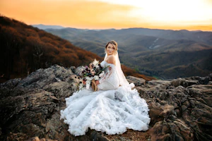 Bride Wearing 3-D Floral Fit-And-Flare Wedding Dress Called Ryker By Sottero And Midgley On A Rocky Mountain