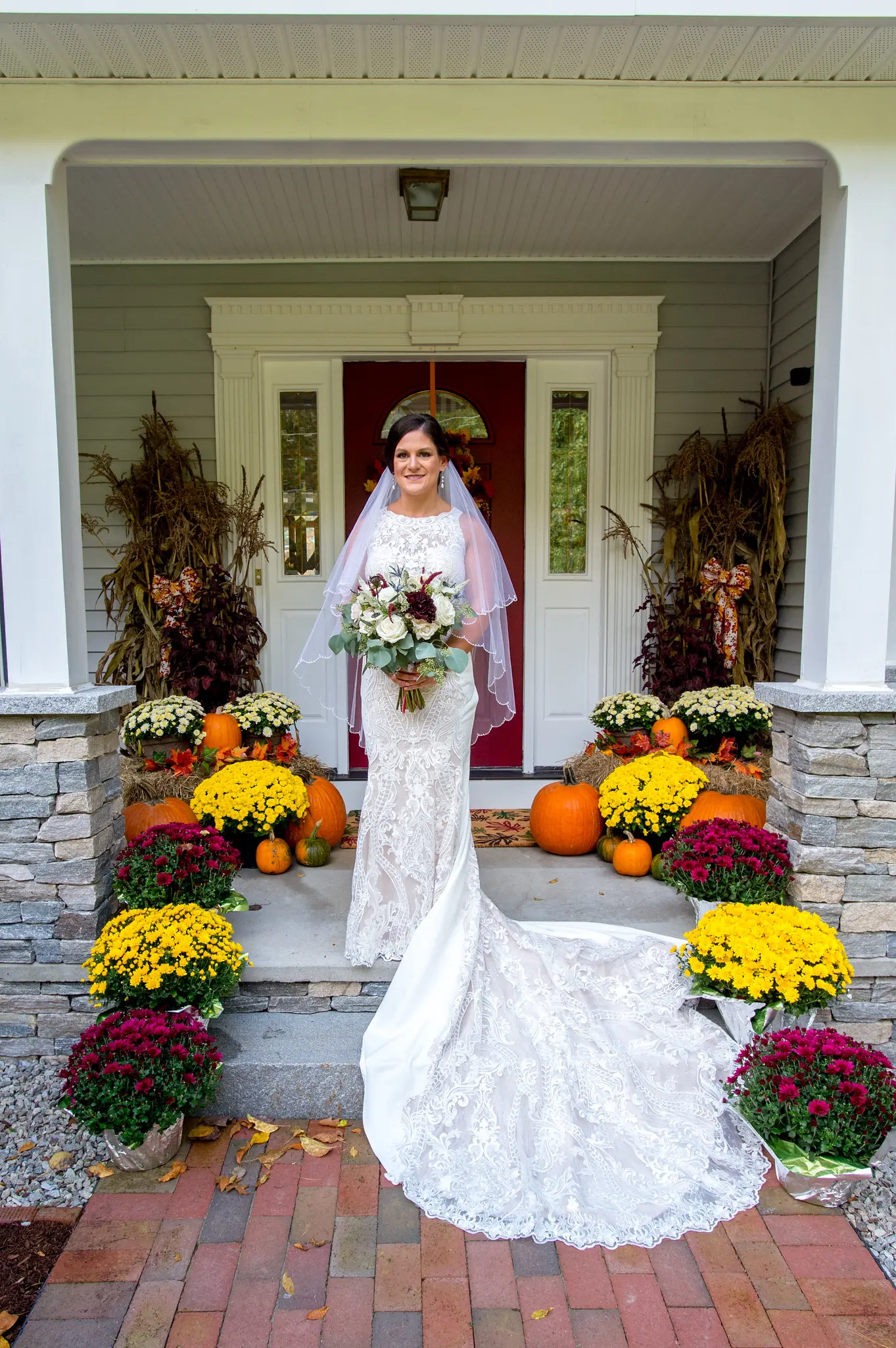 Bride wearing Lace Sheath Wedding Dress called Kevyn by Sottero and Midgley