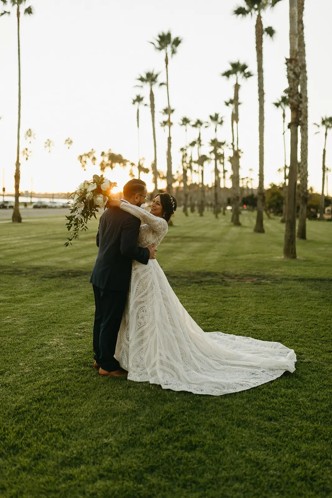 Bride Wearing Boho Lace Wedding Dress Called Roxanne By Sottero And Midgley With Groom In The Park
