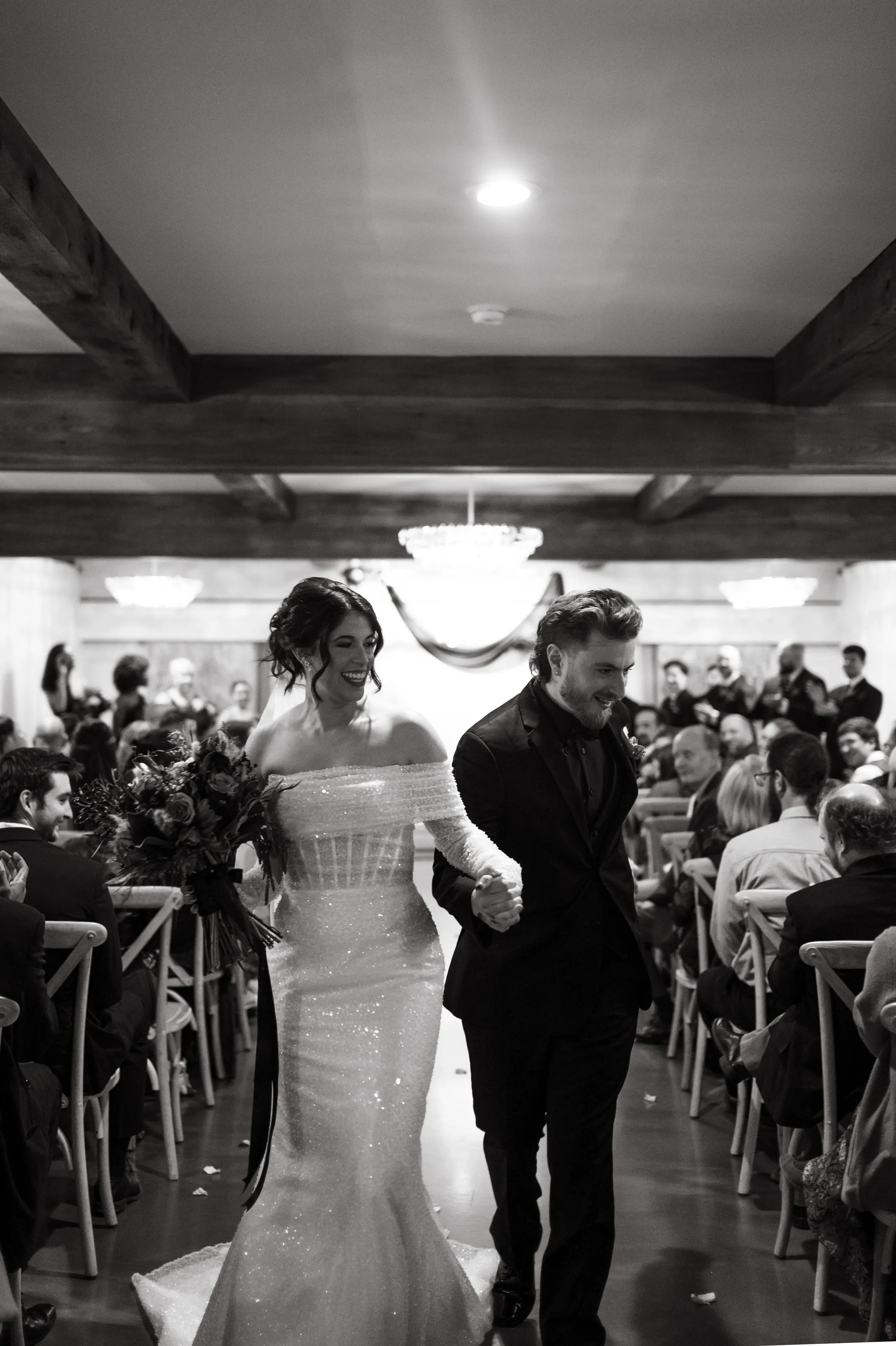 Bride Wearing Pearl Sparkly Wedding Dress Called Drew By Maggie Sottero Walking Down The Aisle With Groom