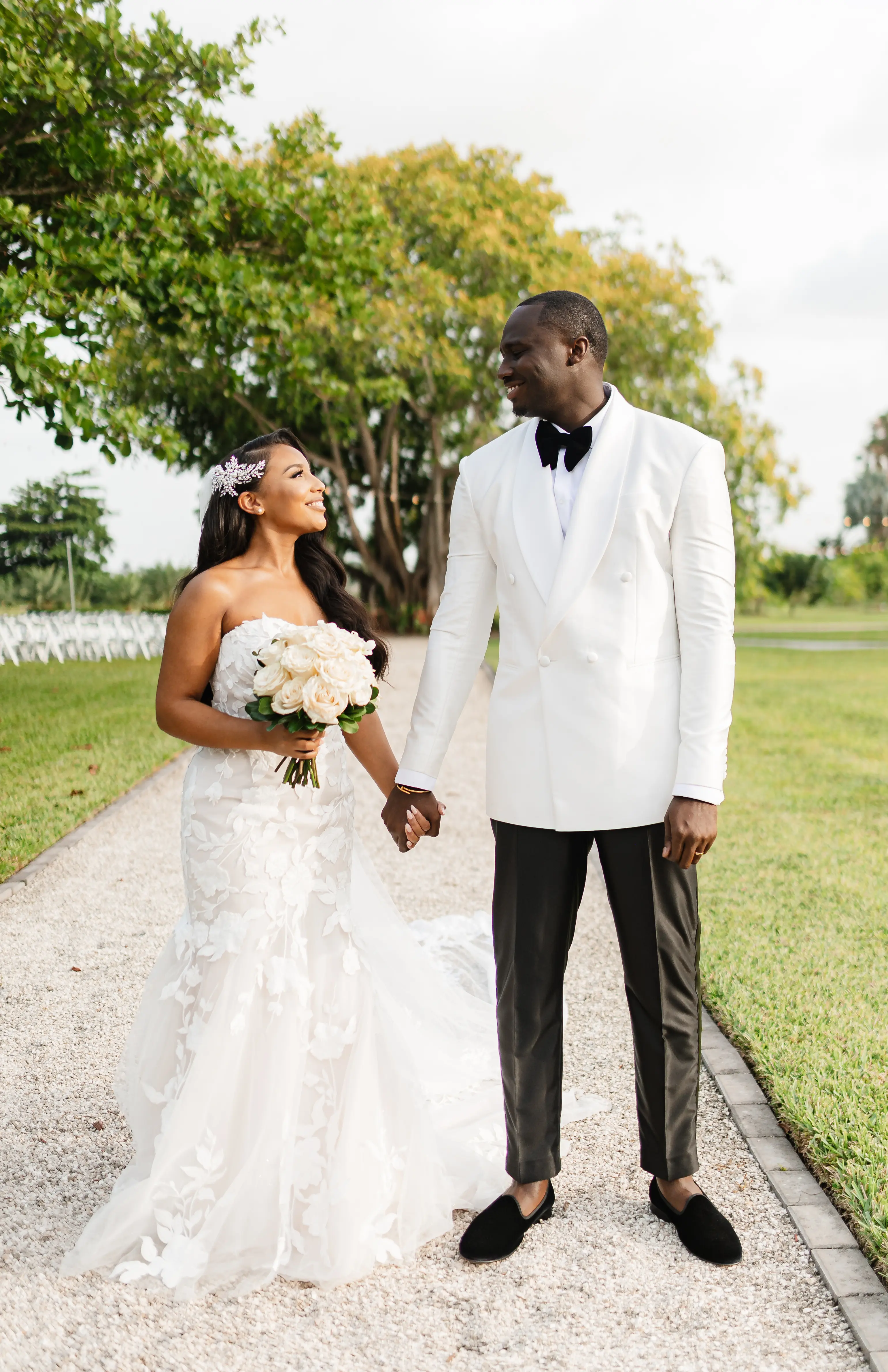 Real Bride in Strapless Mermaid Bridal Gown in Oversized Lace with Floral Lace Motifs over Sparkle Tulle and Sweetheart Neckline called Hattie by Rebecca Ingram