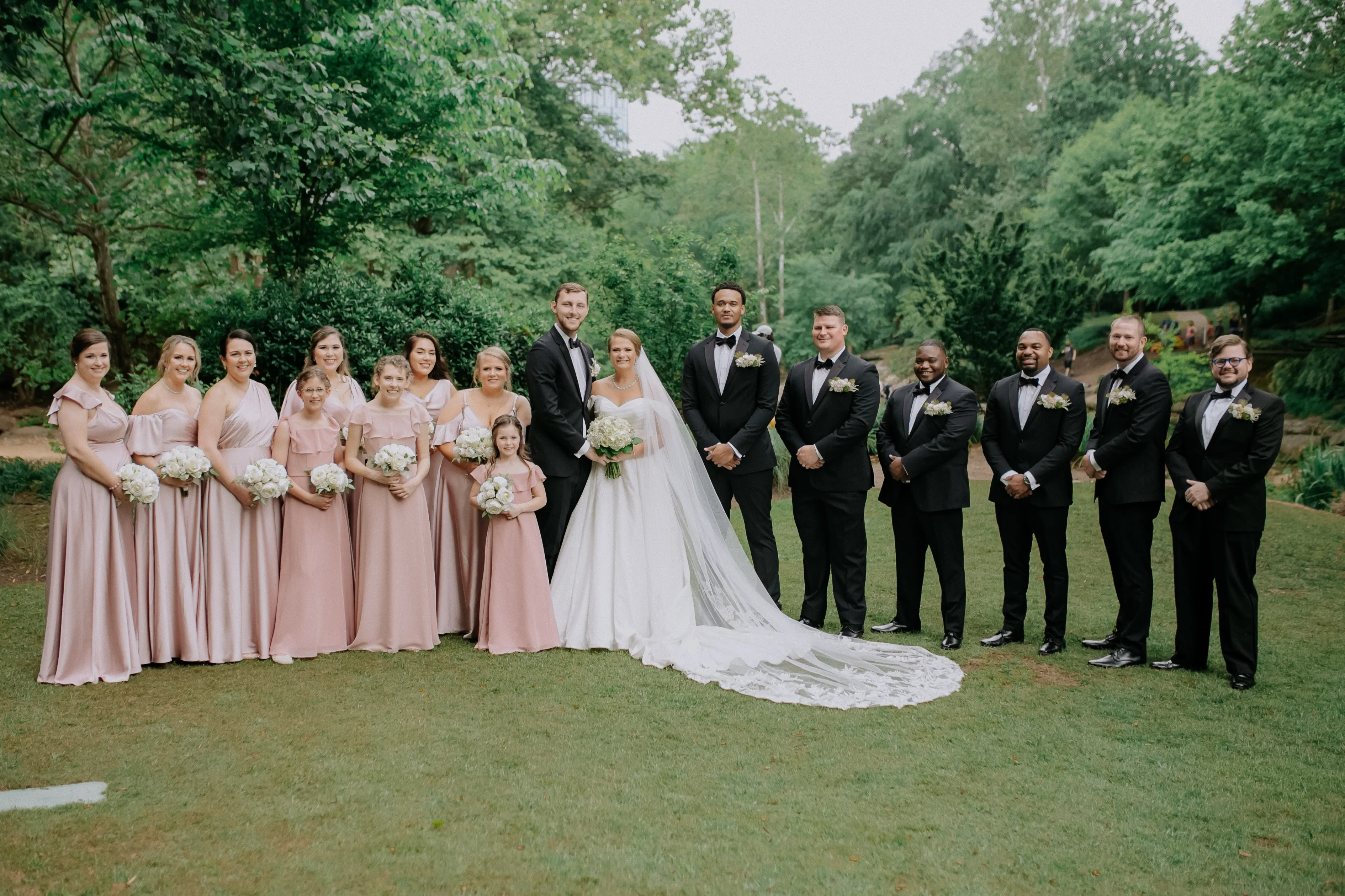 Bride wearing Anniston by Maggie Sottero with her bridal party