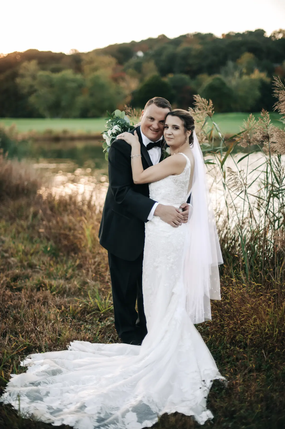 Bride Wearing Nature Lace Wedding Dress Called Albany By Maggie Sottero And Groom Next To A Pond