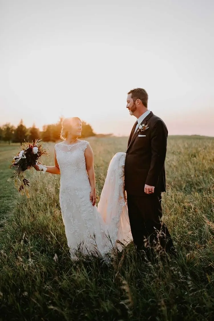 Groom With Bride Wearing Lace Wedding Dress With Illusion Back Verina Marie By Maggie Sottero