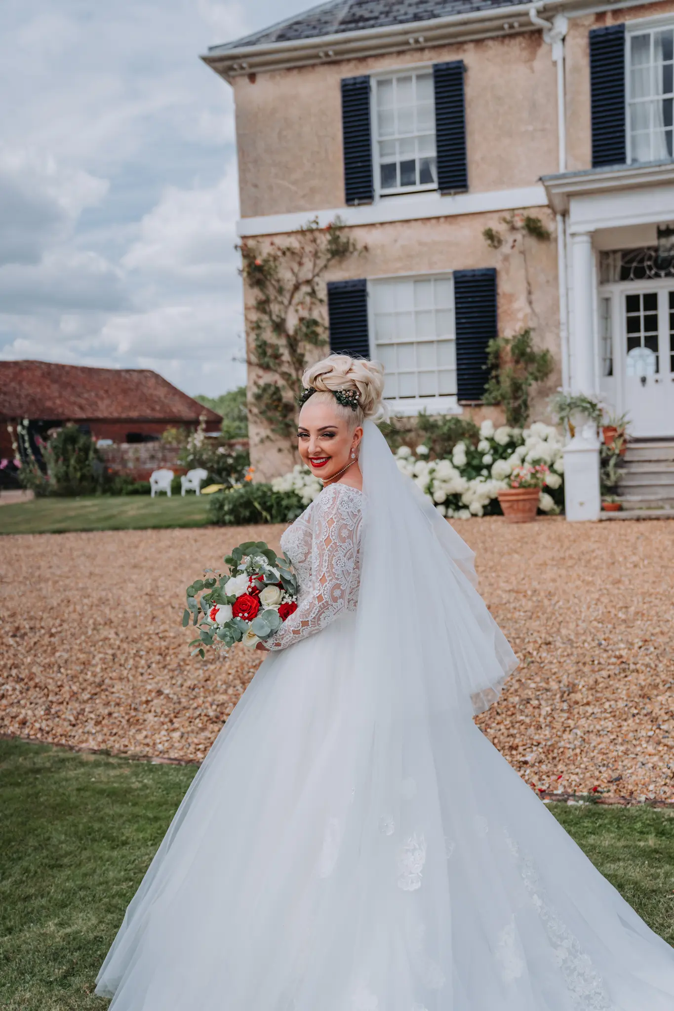 Bride Wearing Elegant Long Sleeved Ball Gown Mallory Dawn By Maggie Sottero