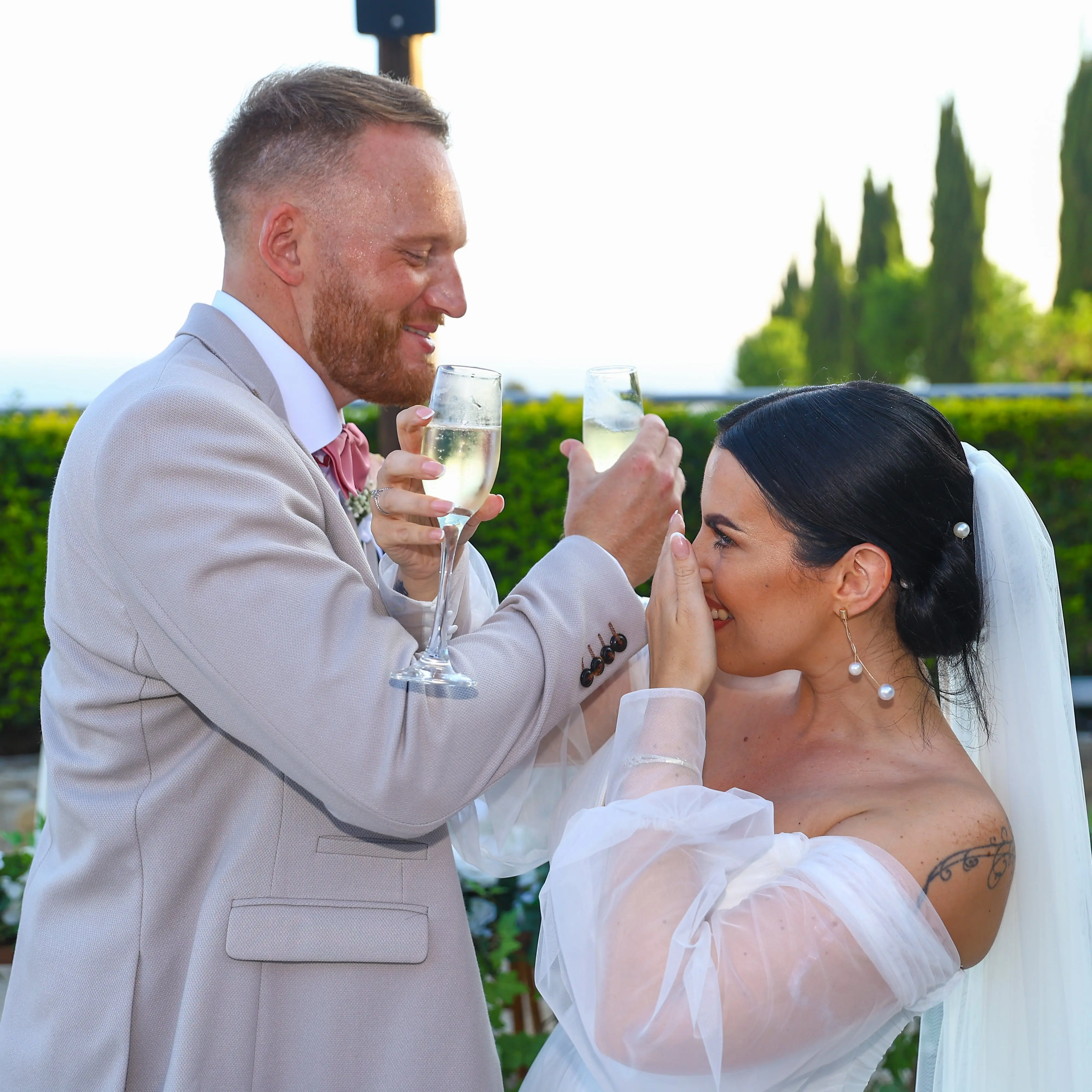 Bride Wearing Boho A-Line Wedding Dress Called Nerida By Sottero And Midgley With Groom