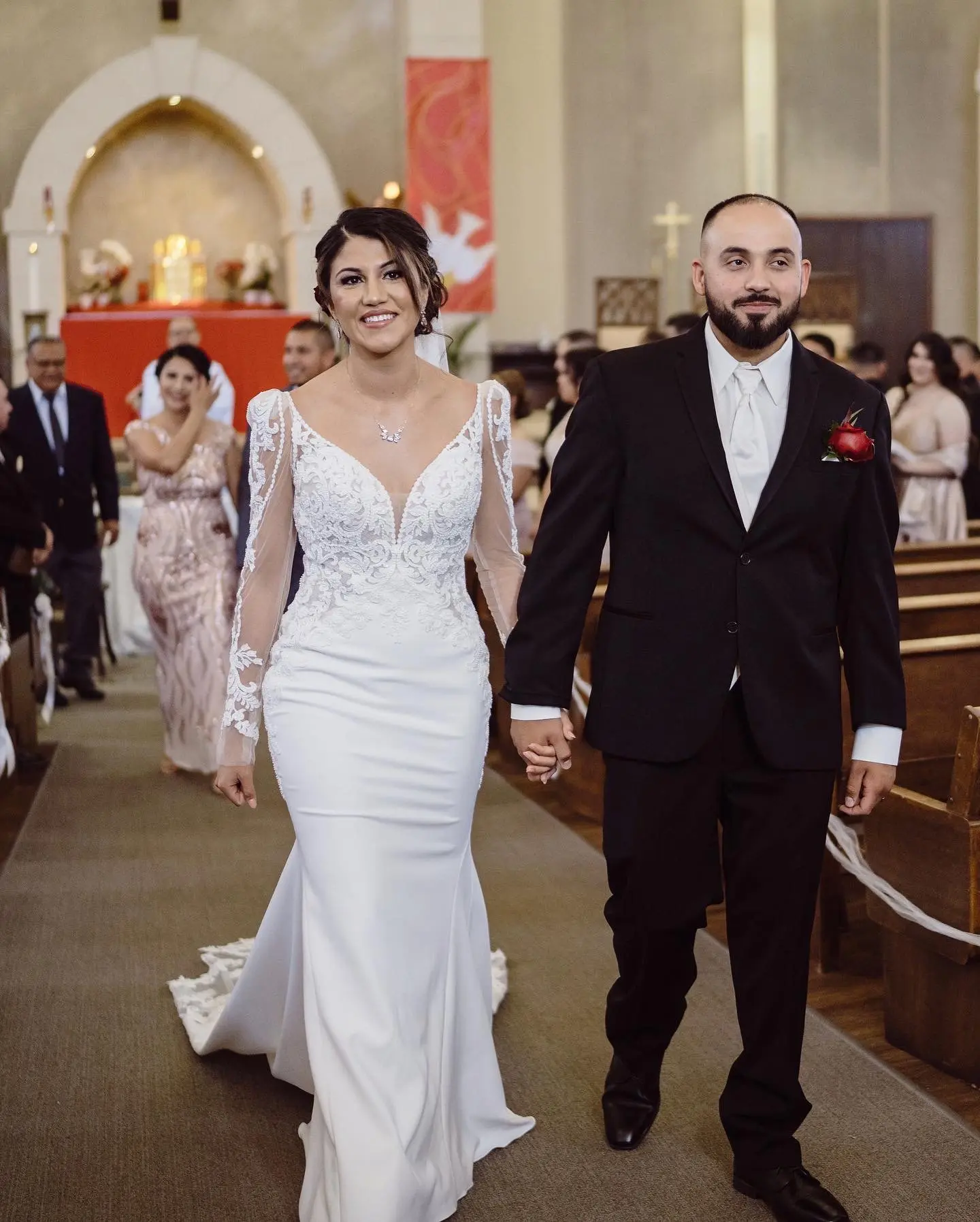 Groom with Bride in Long Illusion Lace Puff Sleeve Mermaid Wedding Gown Called Nikki by Maggie Sottero
