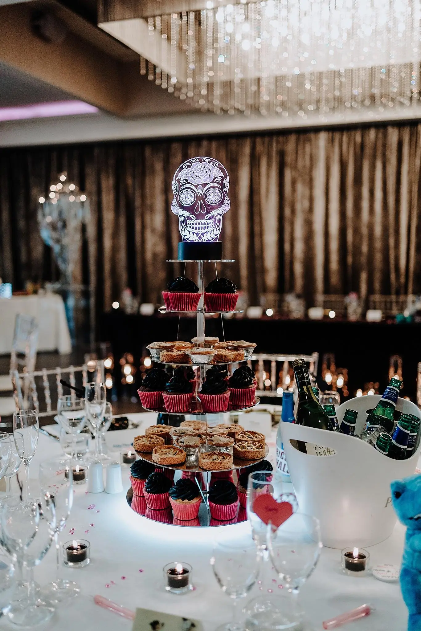 A Sugar Skull Cupcake And Donut Tower For A Wedding