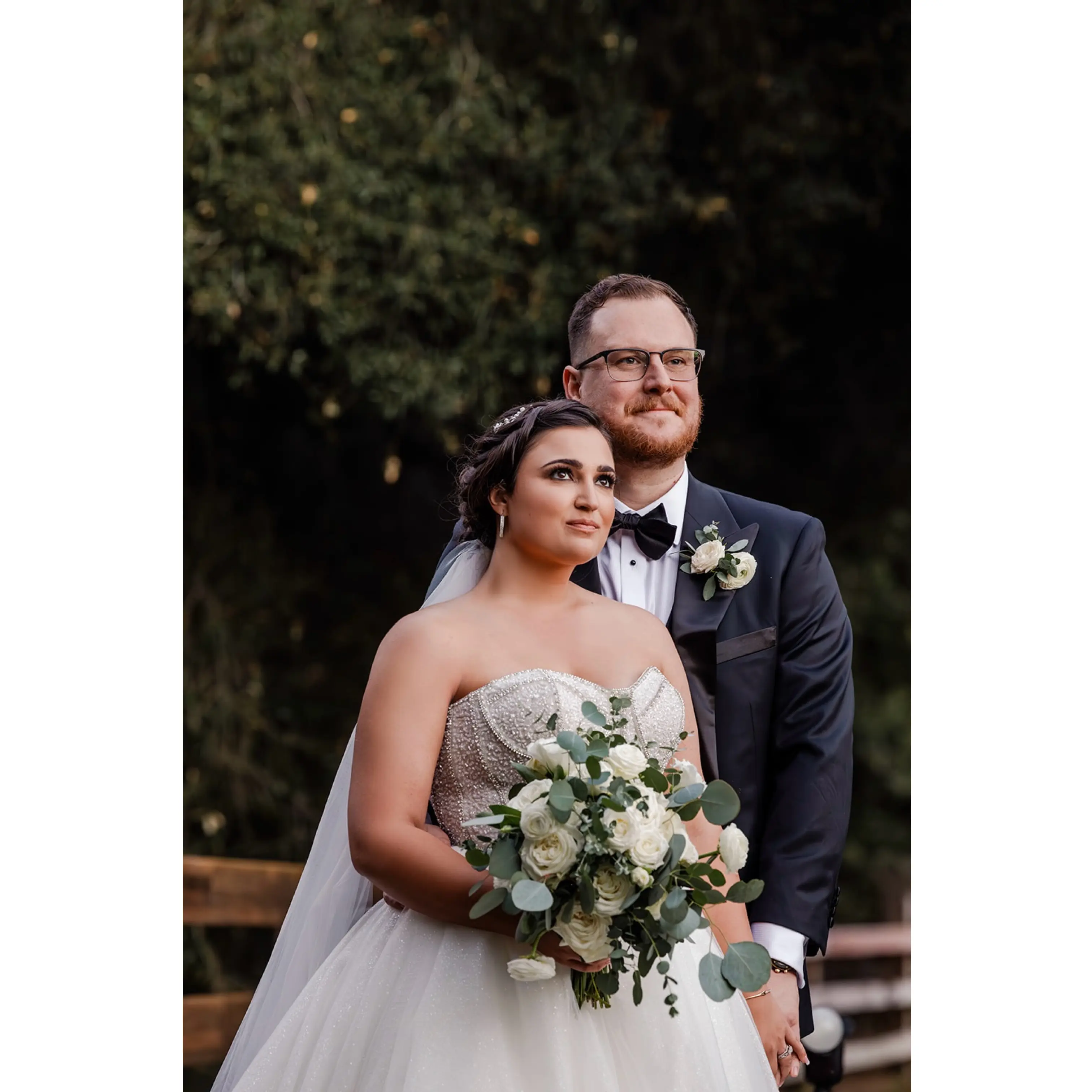 Bride wearing Elton wedding dress by Sottero and Midgley with her husband