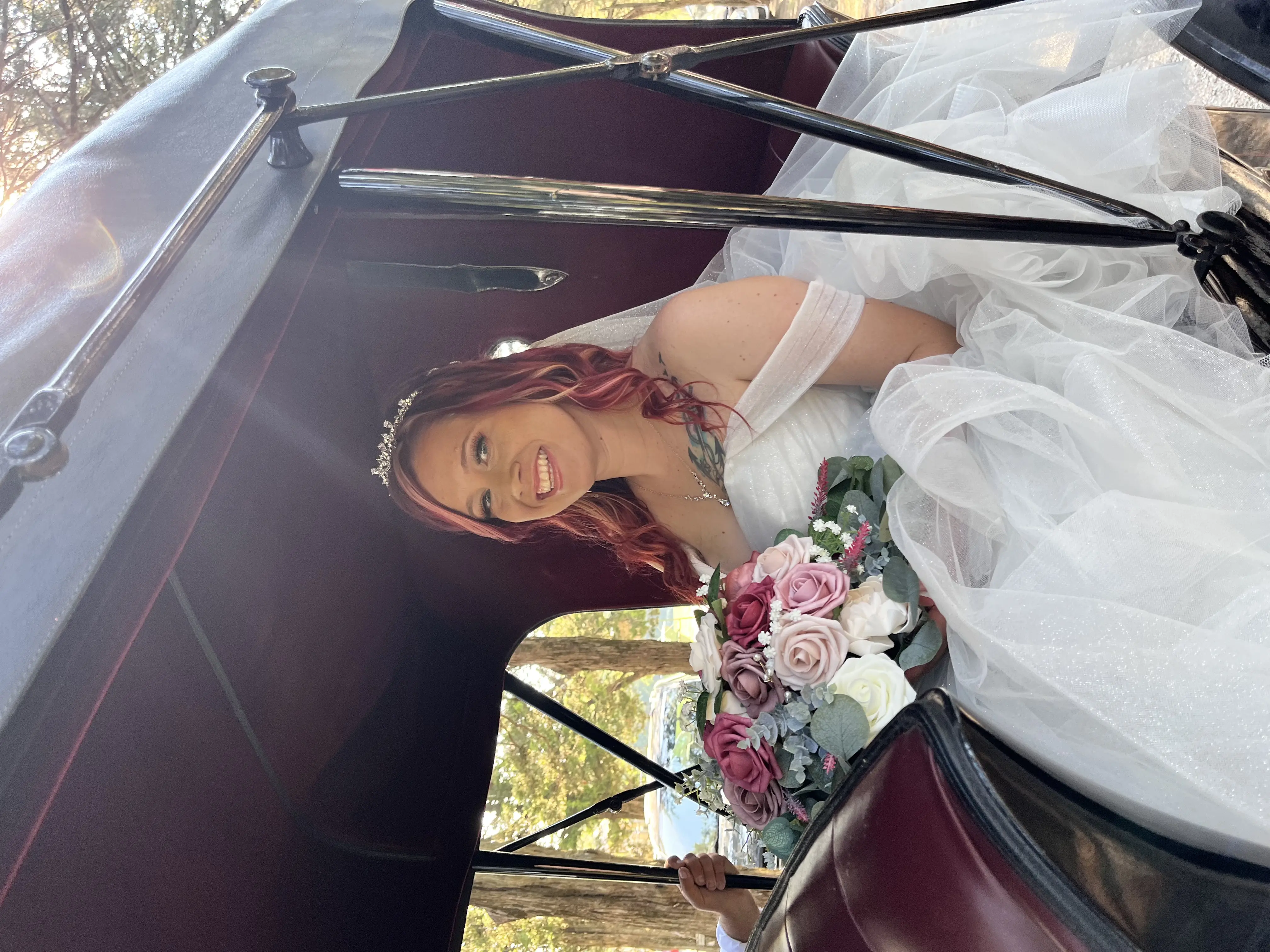 Bride Wearing Sparkly Princess Ballgown Wedding Dress Called Yasmin By Maggie Sottero Sitting In A Horse Drawn Carriage