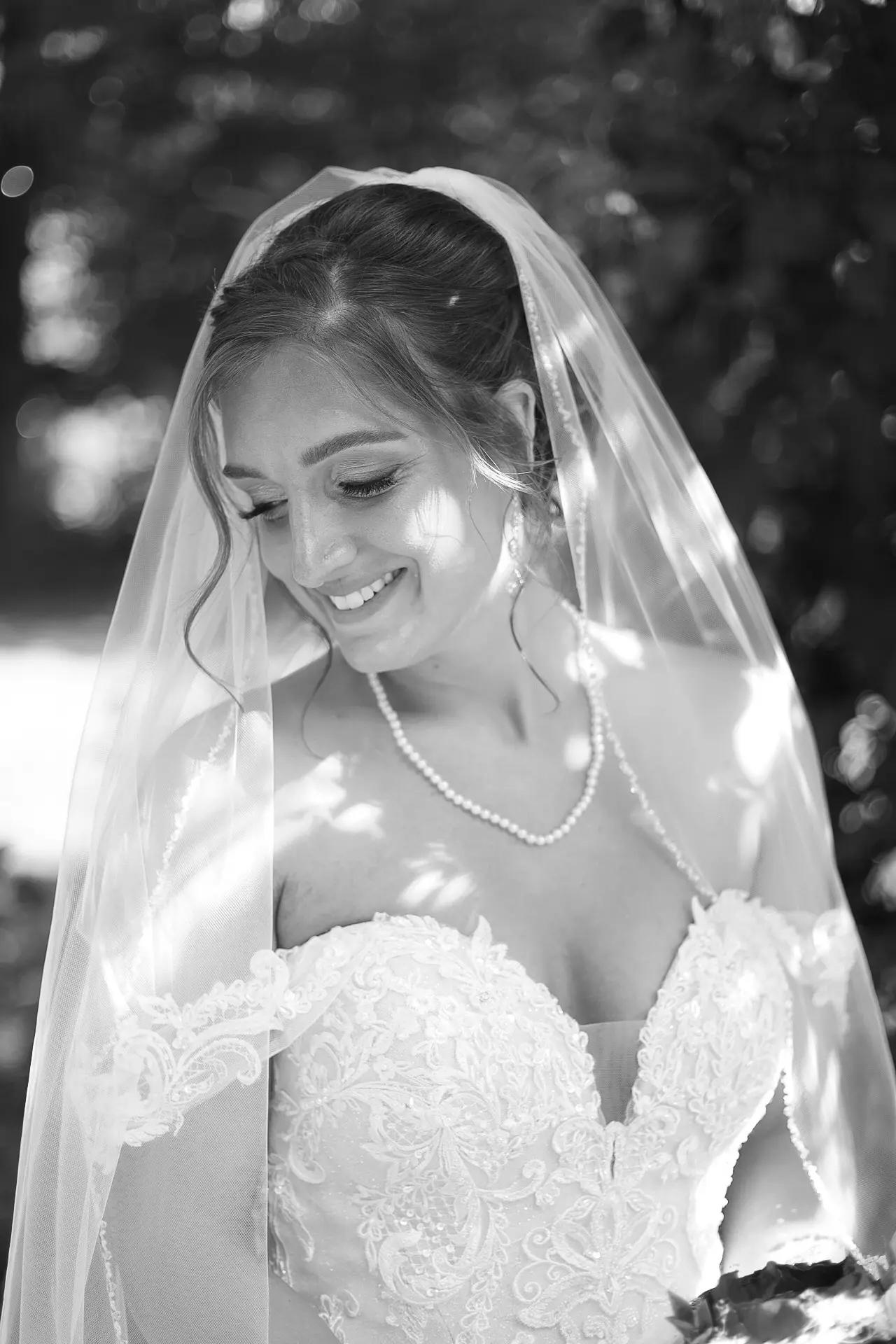 Bride wearing Marguerite wedding dress by Maggie Sottero
