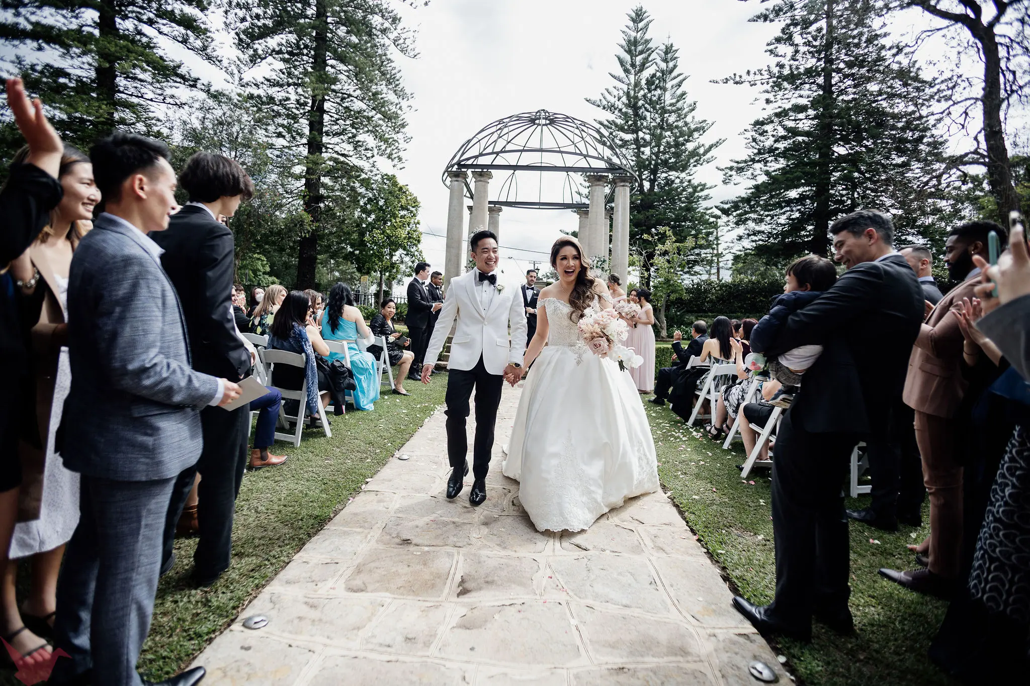 Bride Wearing Princess Ballgown Wedding Dress Called Kimora By Sottero And Midgley Walking Down The Aisle With Groom