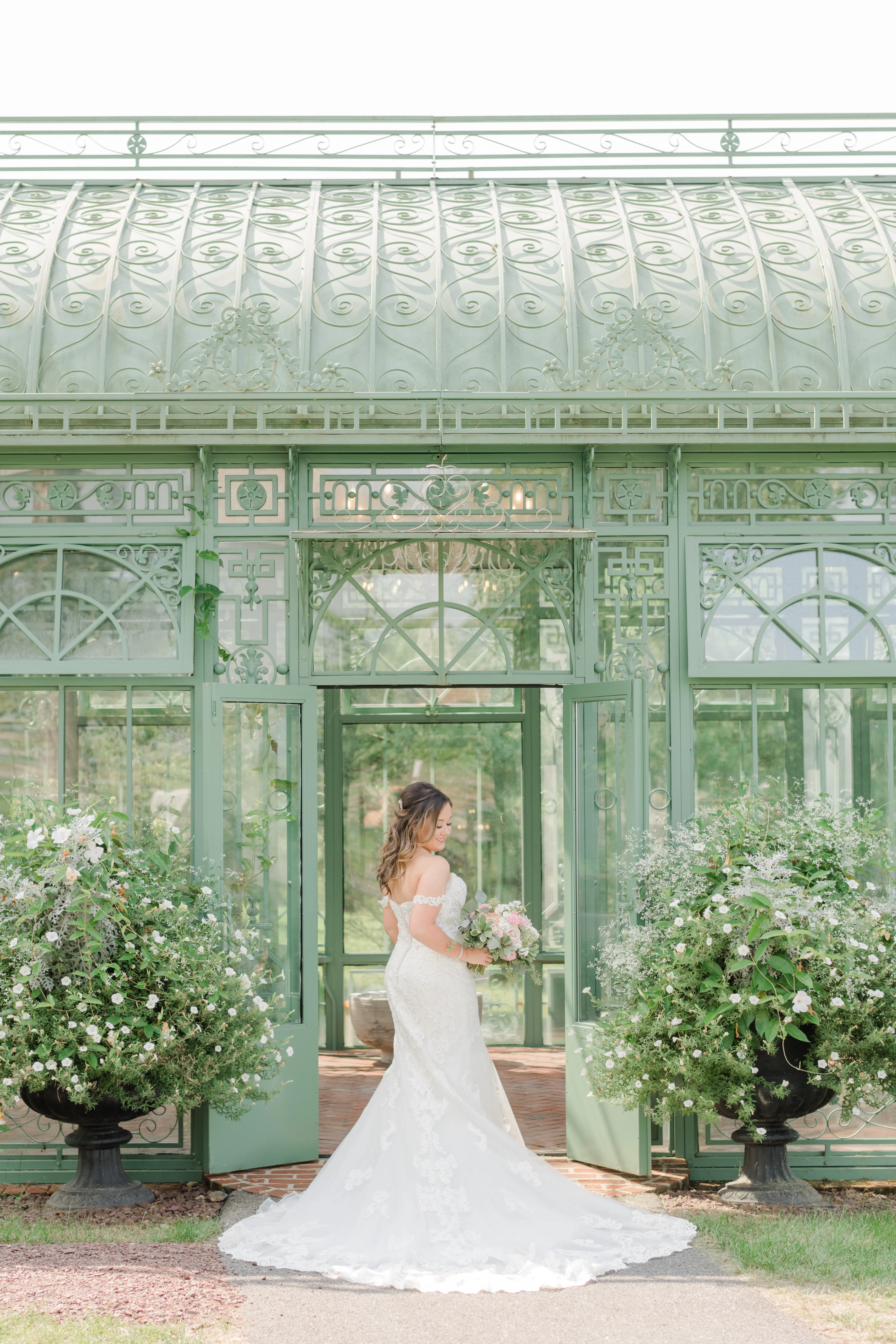 Real bride's sparkly lace fit-and-flare bridal dress with plunging illusion sweetheart neckline called Fiona by Maggie Sottero