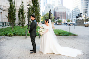Bride Wearing Modern Ballgown Wedding Dress Called Aspen By Sottero And Midgley With Groom For The First Look