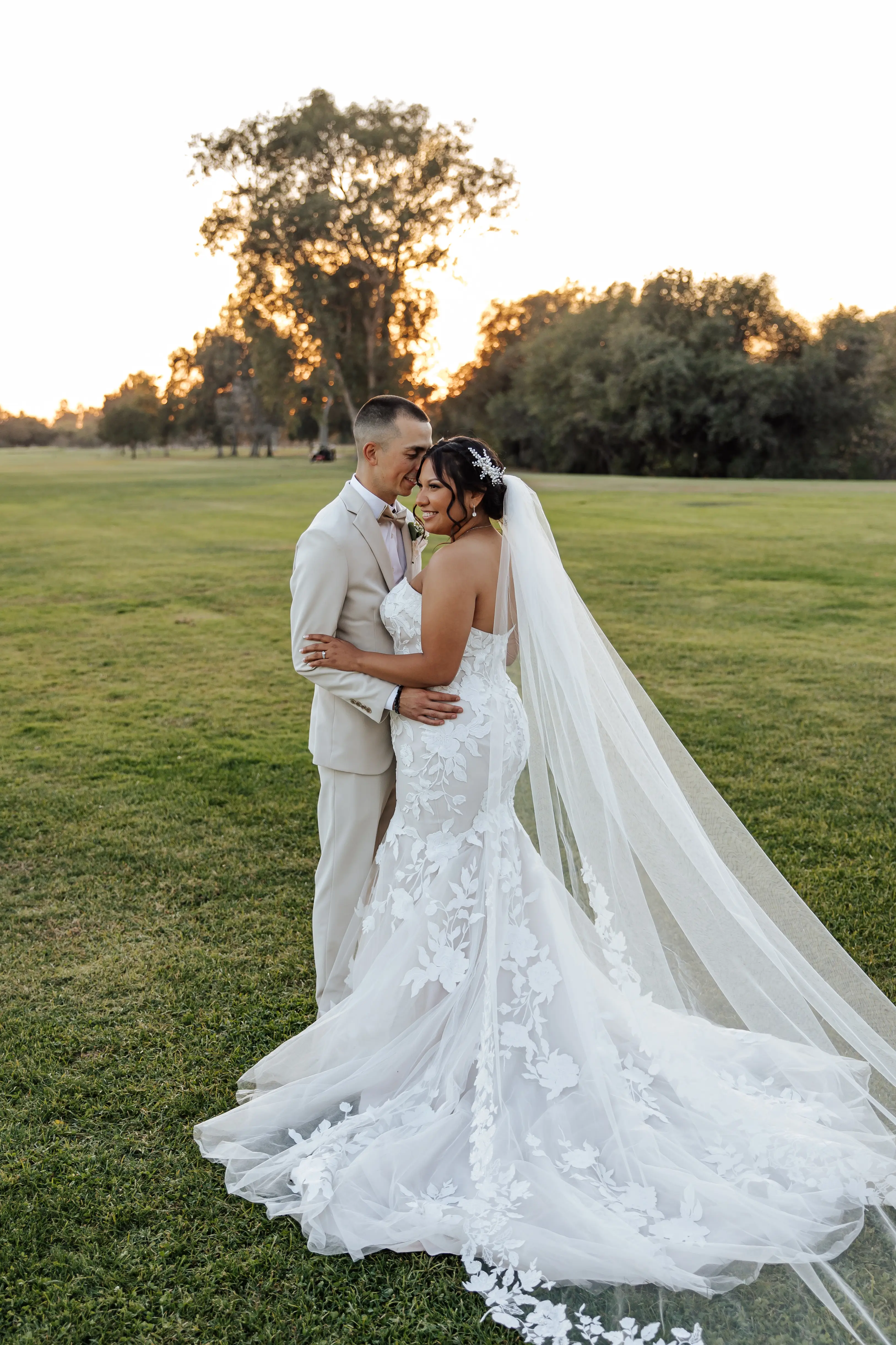 Real Bride in Strapless Mermaid Bridal Gown with Oversize Floral Lace Motifs Over Sparkle Tulle Called Hattie by Rebecca Ingram