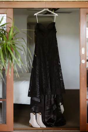Black Lace Wedding Dress Called Penny By Maggie Sottero Hanging