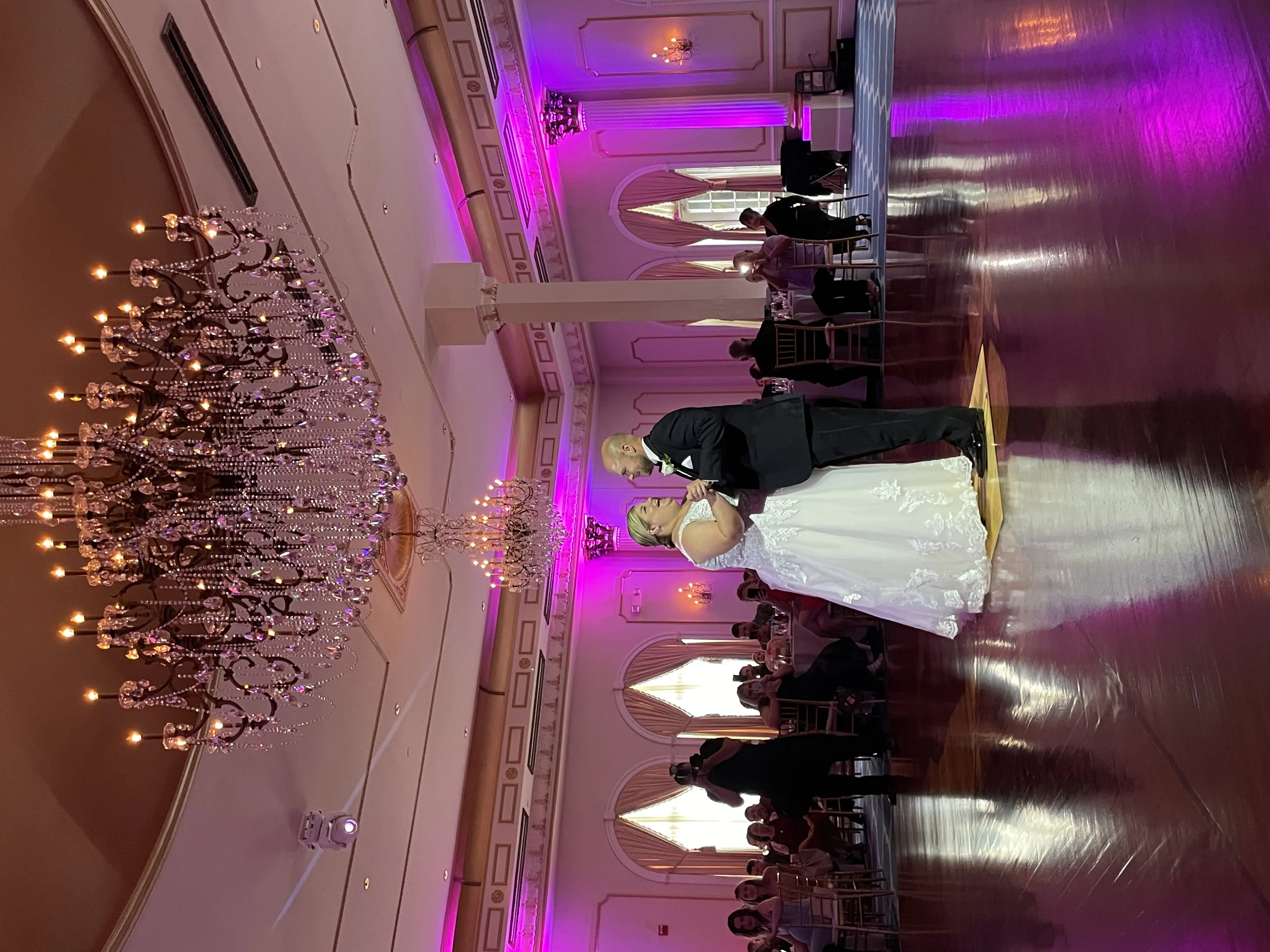 Bride wearing Lace A-line Wedding Dress called Trinity Lynette by Maggie Sottero dancing with the groom