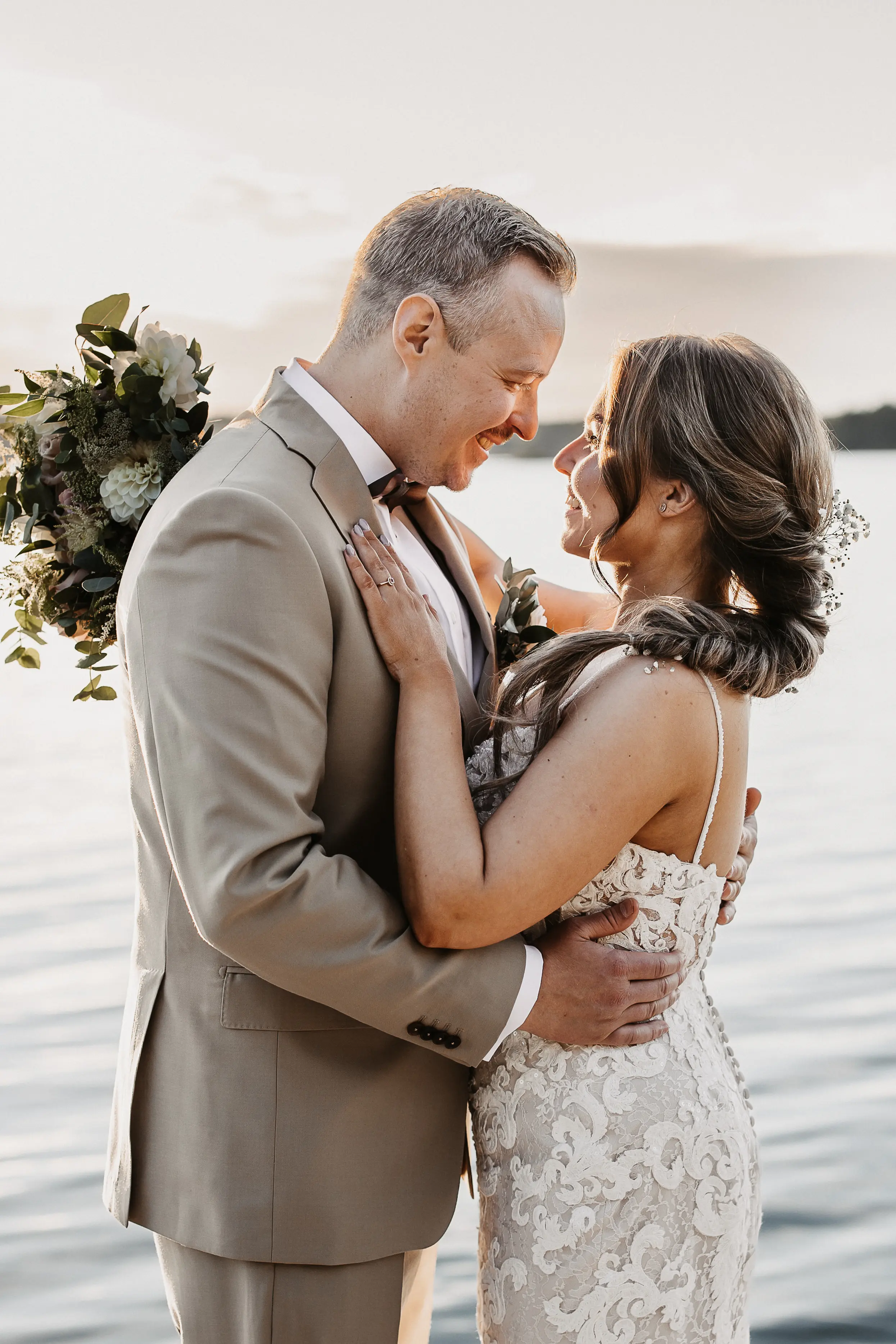 Bride Wearing Sexy Lace Wedding Dress Called Tuscany Lynette By Maggie Sottero Looking At Groom