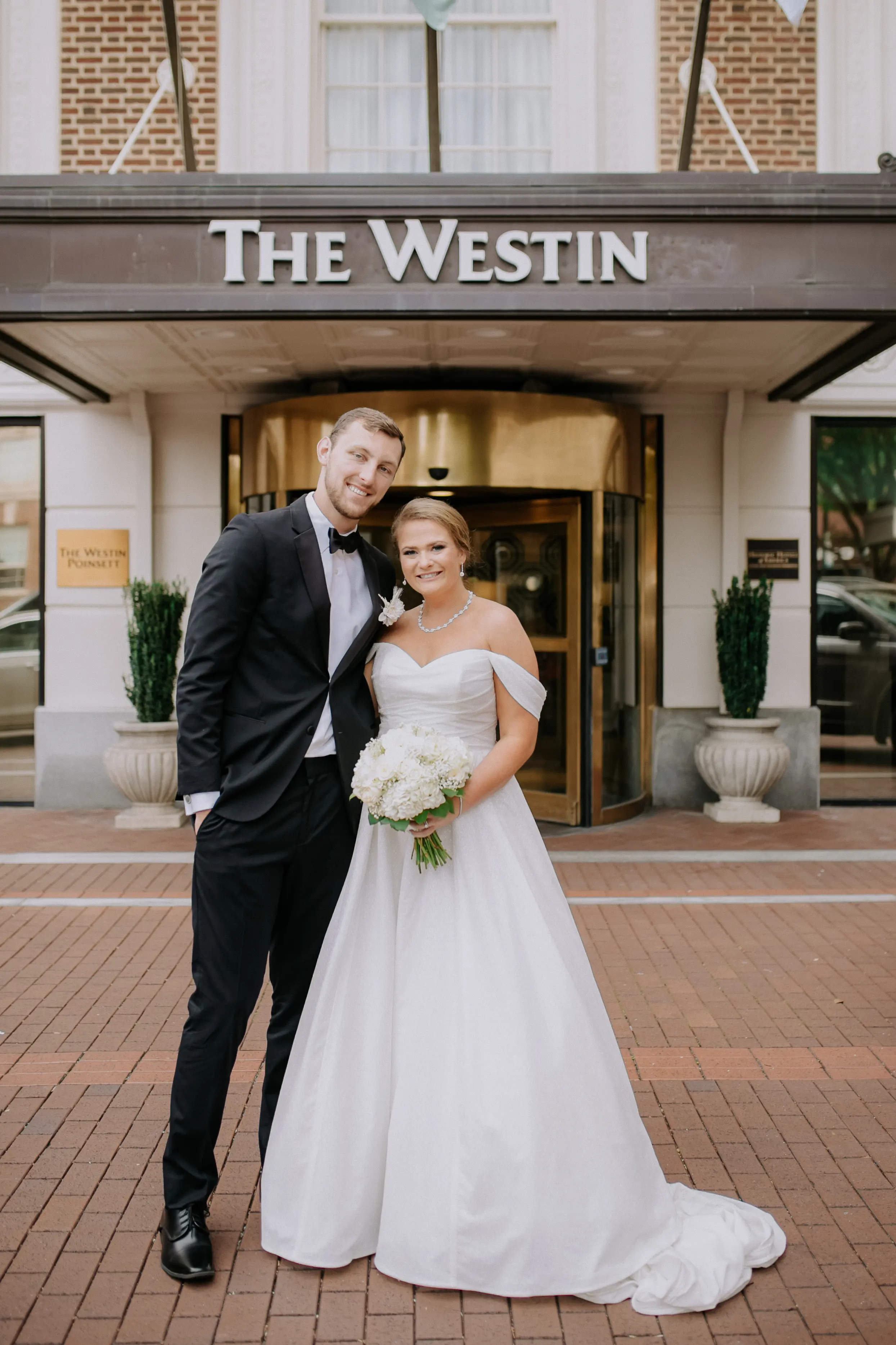 Bride wearing Anniston by Maggie Sottero outside their venue