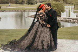 Groom Kissing Bride In Black Lace Ball Gown Wedding Dress Called Zander By Sottero And Midgley