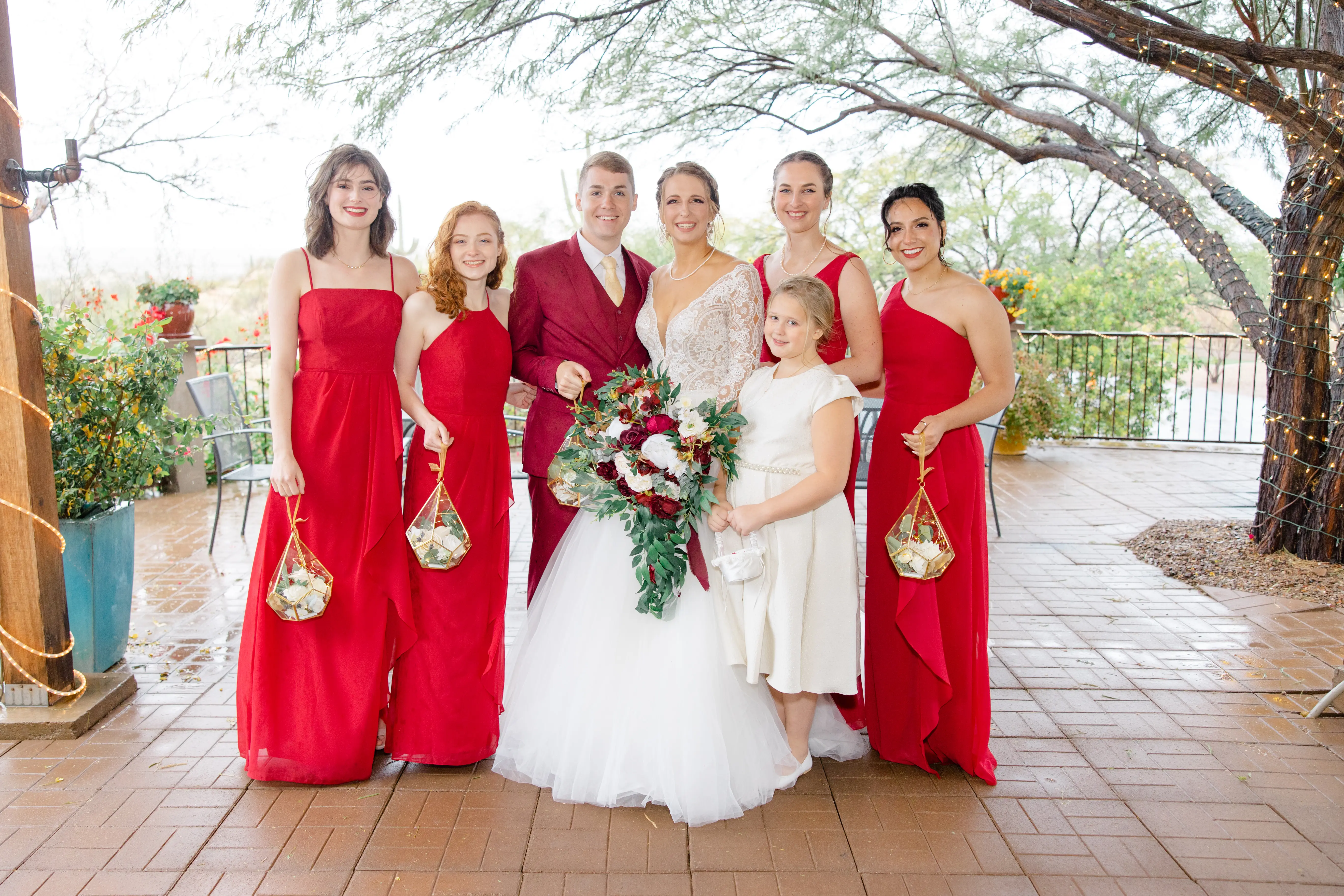 Bridal Party with Bride in Romantic Long Sleeve Ball Gown Wedding Dress with Lace Motifs on Nude Bodice and Tulle Skirt Called Mallory Dawn by Maggie Sottero