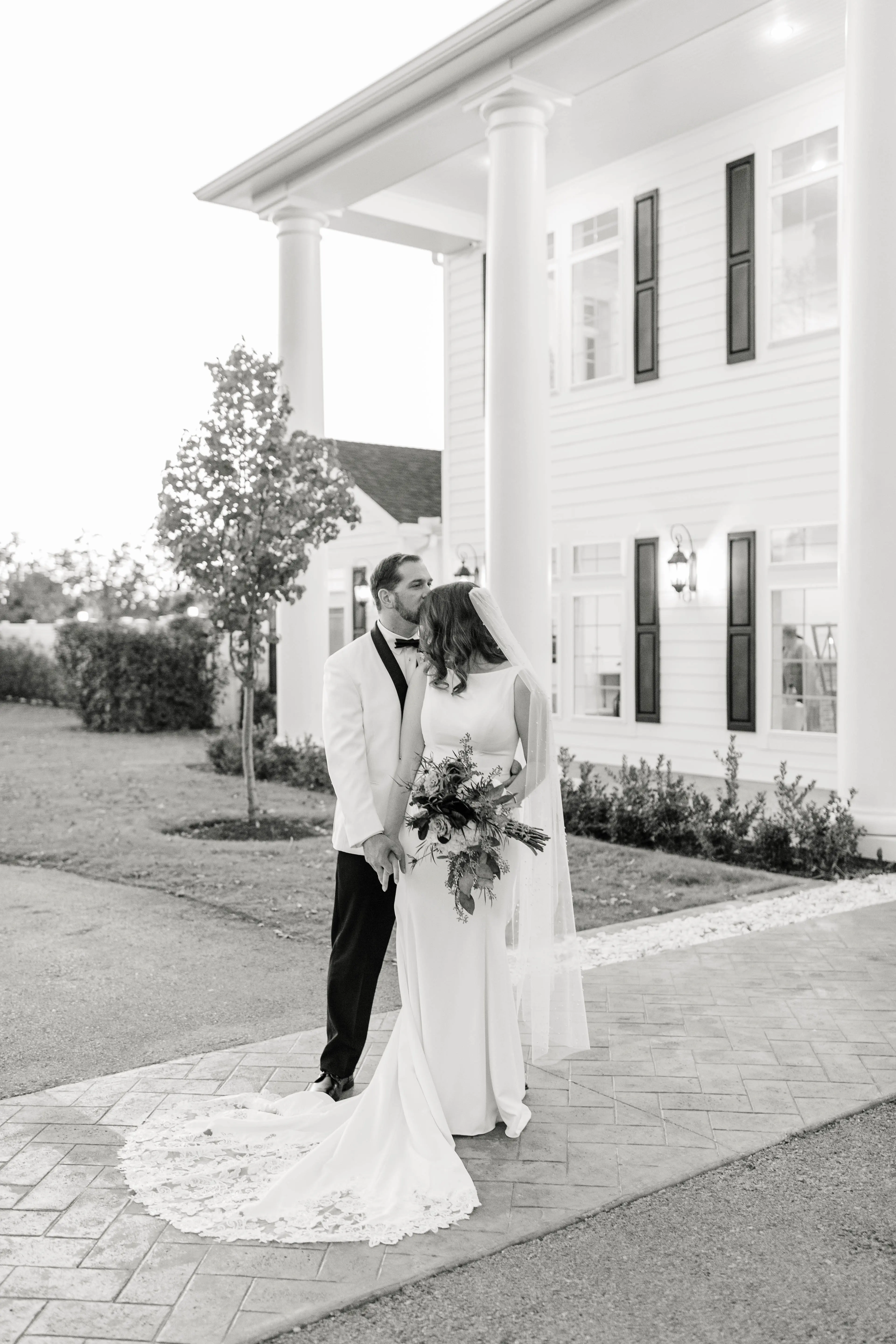 Groom With Bride Wearing Classic Sheath Wedding Dress Alice By Rebecca Ingram