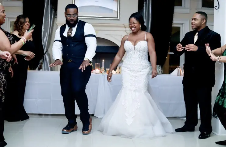 Bride wearing Lace Mermaid Wedding Dress called Alistaire by Maggie Sottero dancing with her groom
