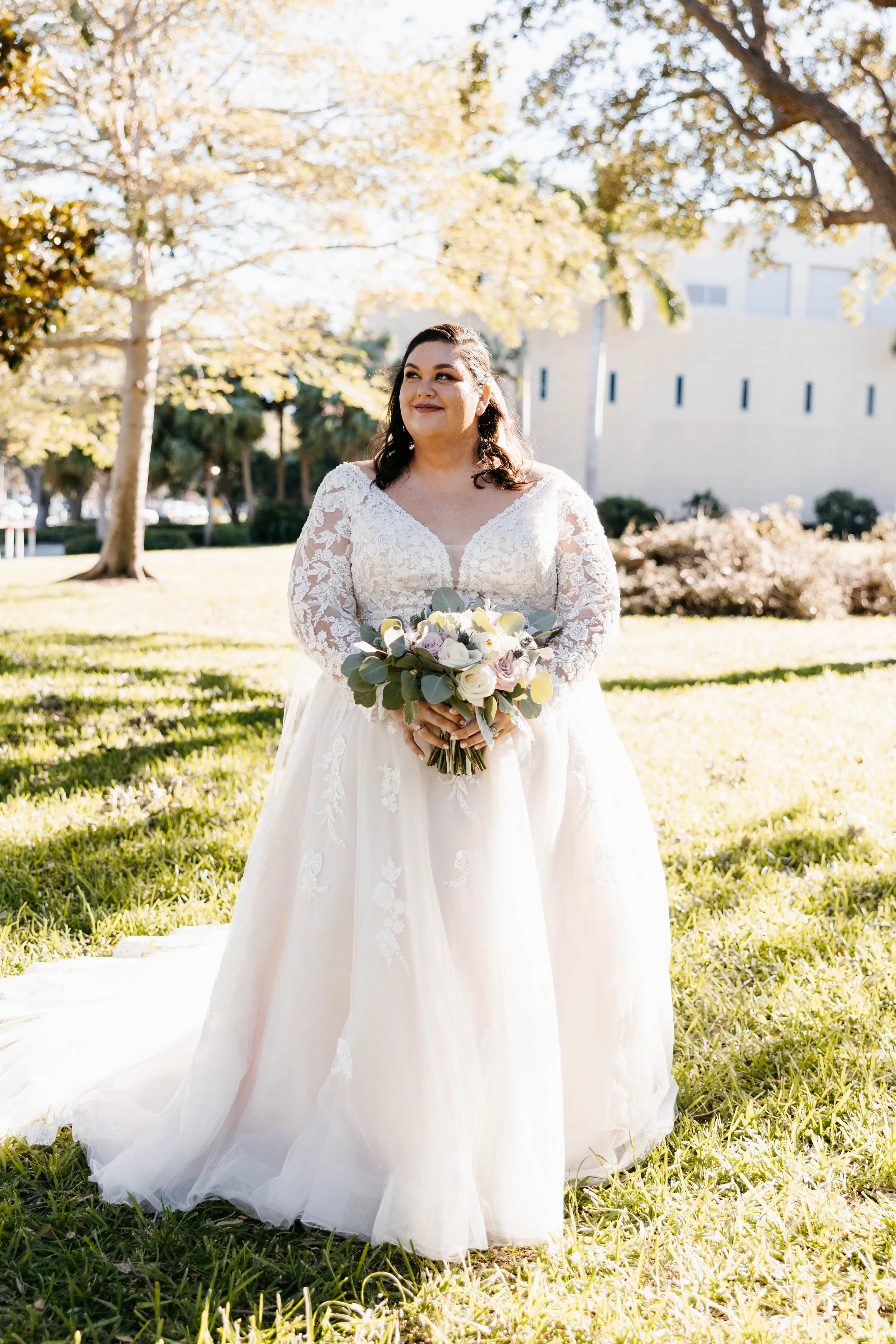 Bride Wearing Illusion Sleeve A-Line Wedding Dress Raphael By Maggie Sottero