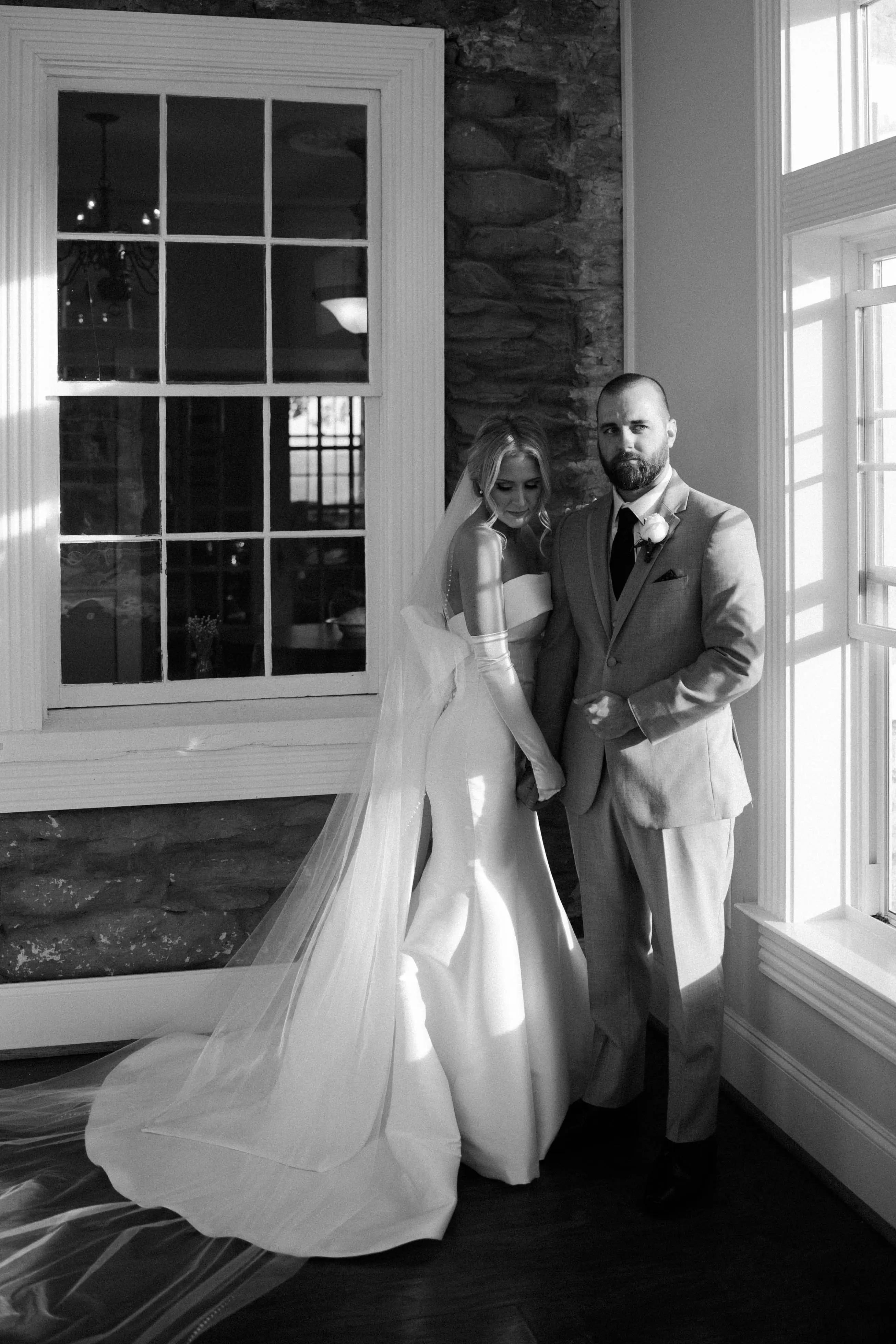 Groom With Bride In A White Strapless Wedding Dress Named Mitchell By Maggie Sottero