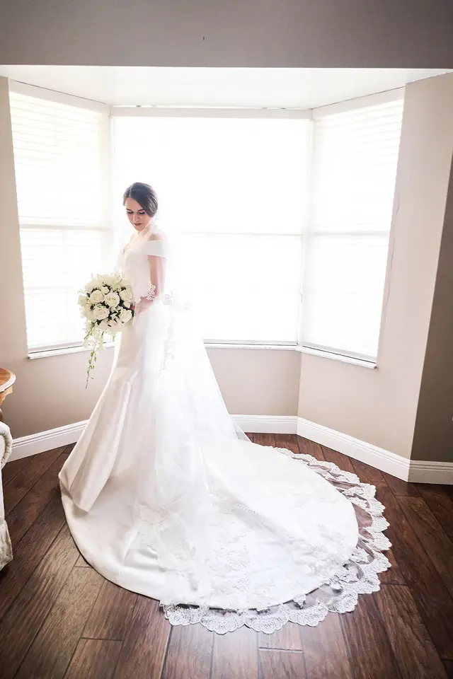 bride in off the shoulder elegant wedding dress