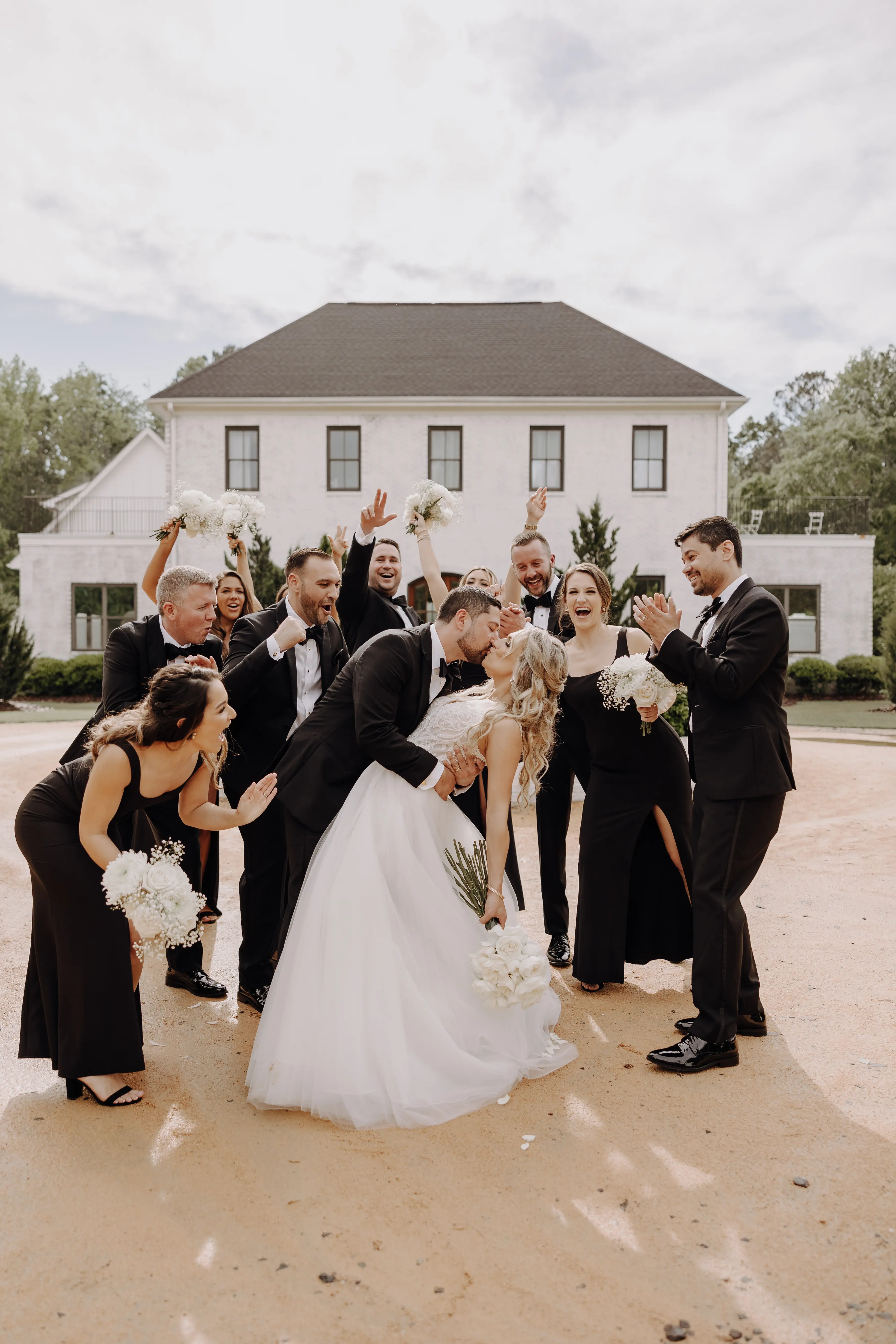 Bride In Lace Sheath Gown Hamilton By Sottero Midgley With Guests