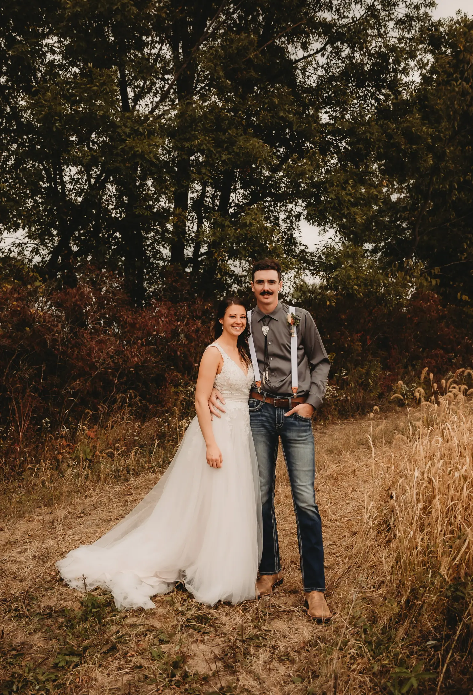 Real Bride in A-Line Wedding Dress with Flowy Tulle Skirt and Sheer Lace Bodice Called Ohara by Maggie Sottero