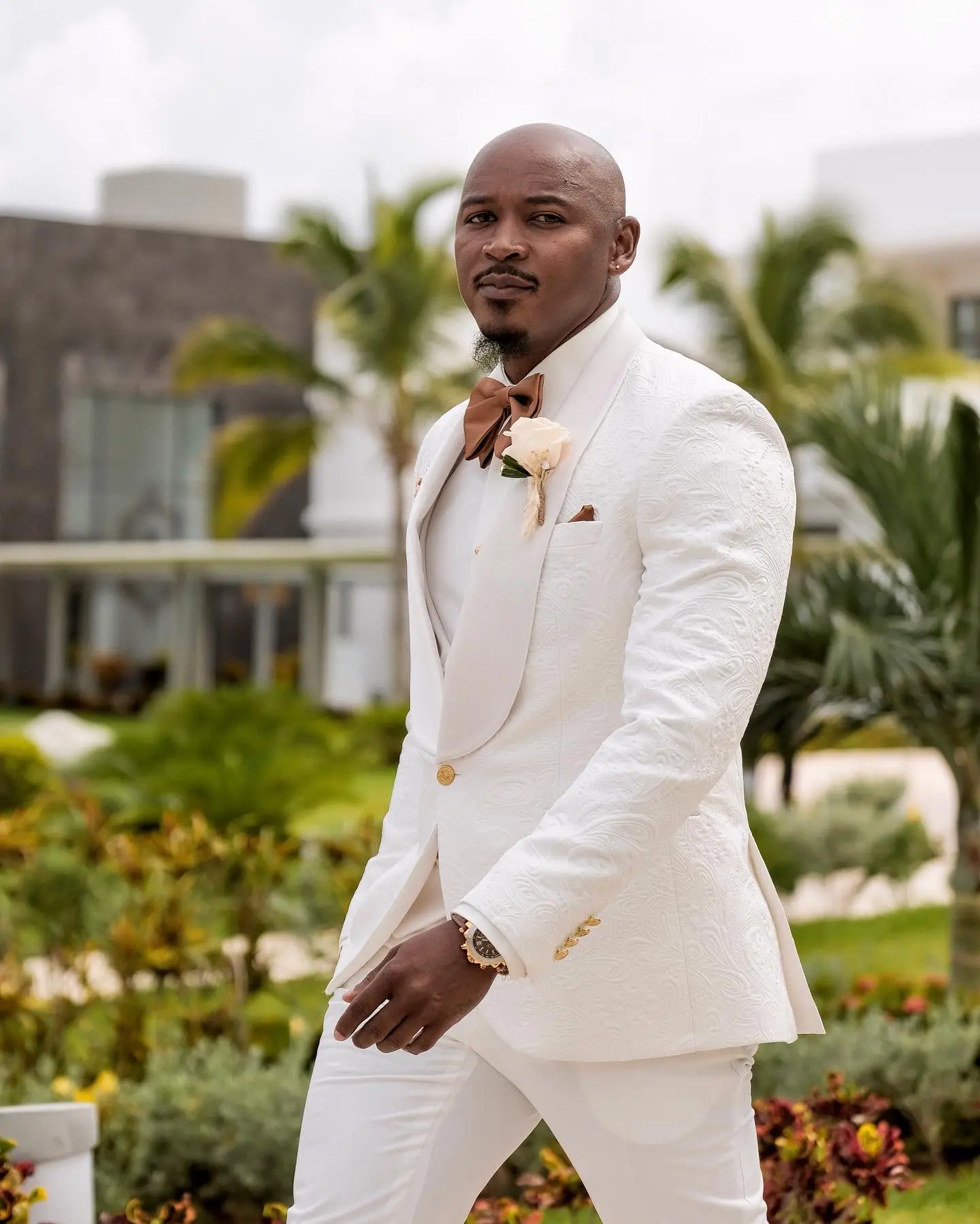 Groom In White Suit