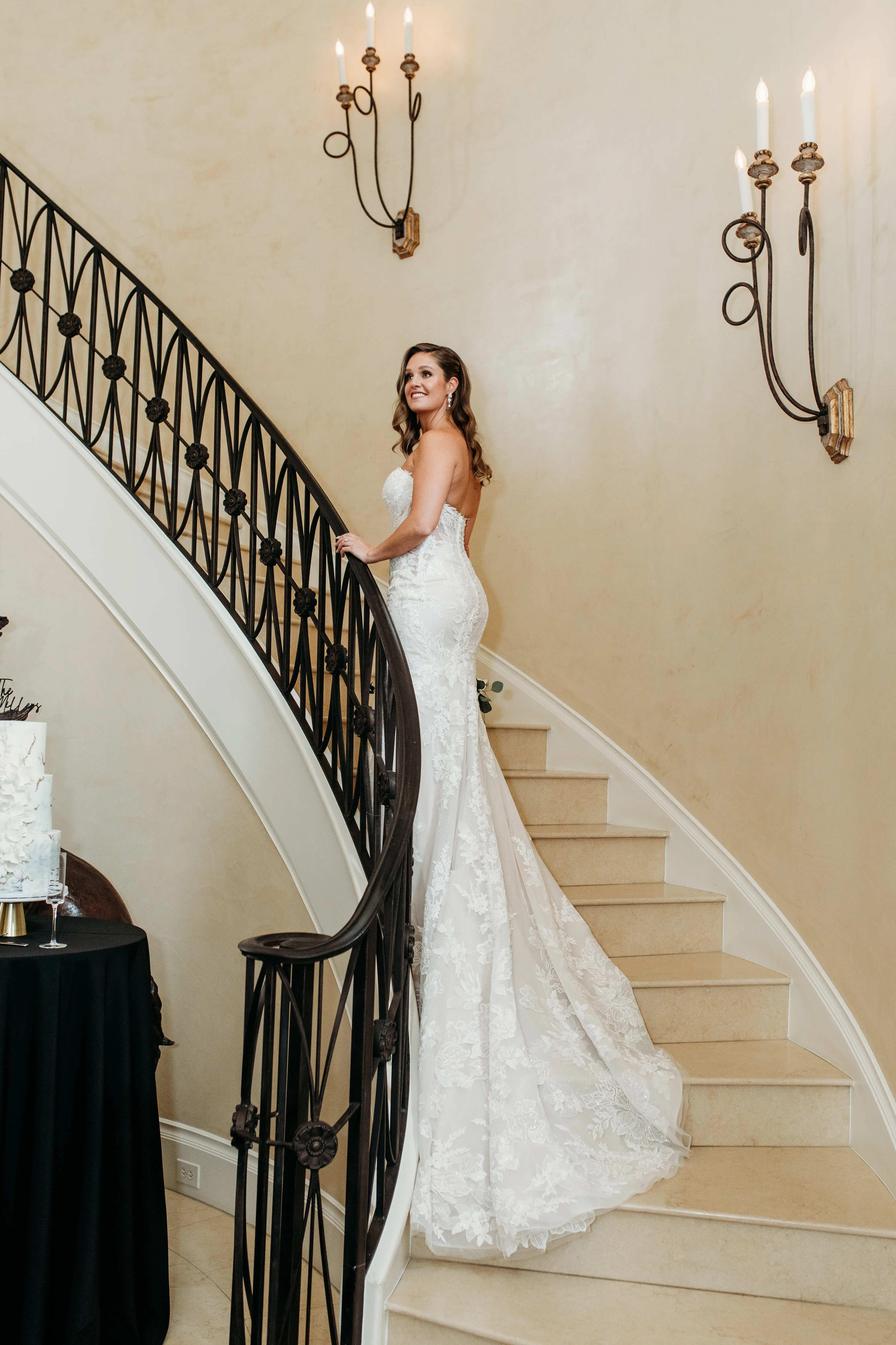 Bride Wearing Lace Mermaid Wedding Gown Called Montgomery By Sottero and Midgley Walking Up The Stairs