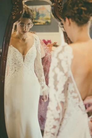 Bride Wearing Lace Mermaid Wedding Gown Called Nikki By Maggie Sottero Looking In The Mirror