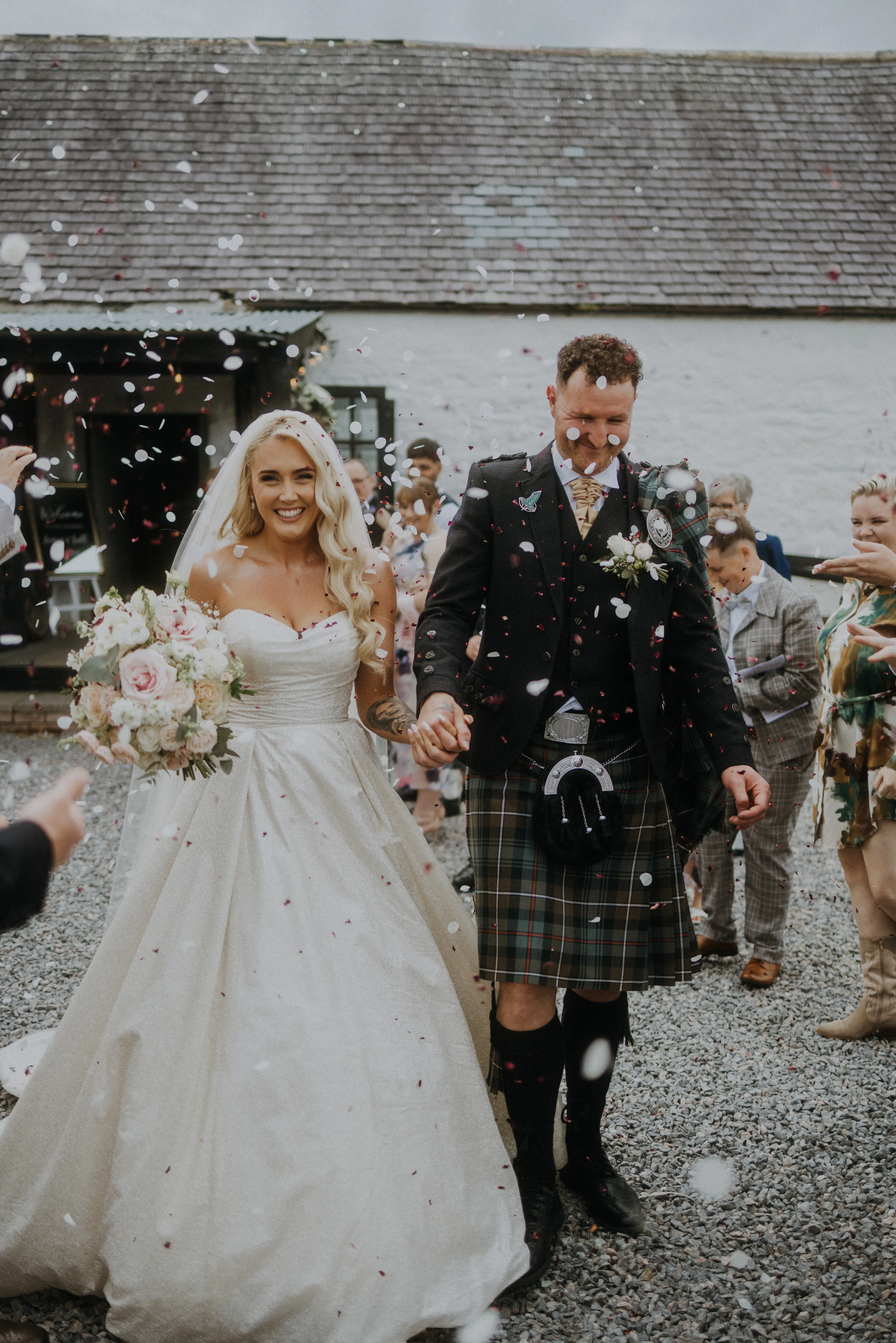 Bride Wearing Sparkly Aline Wedding Dress Called Anniston Holding Hands With Groom