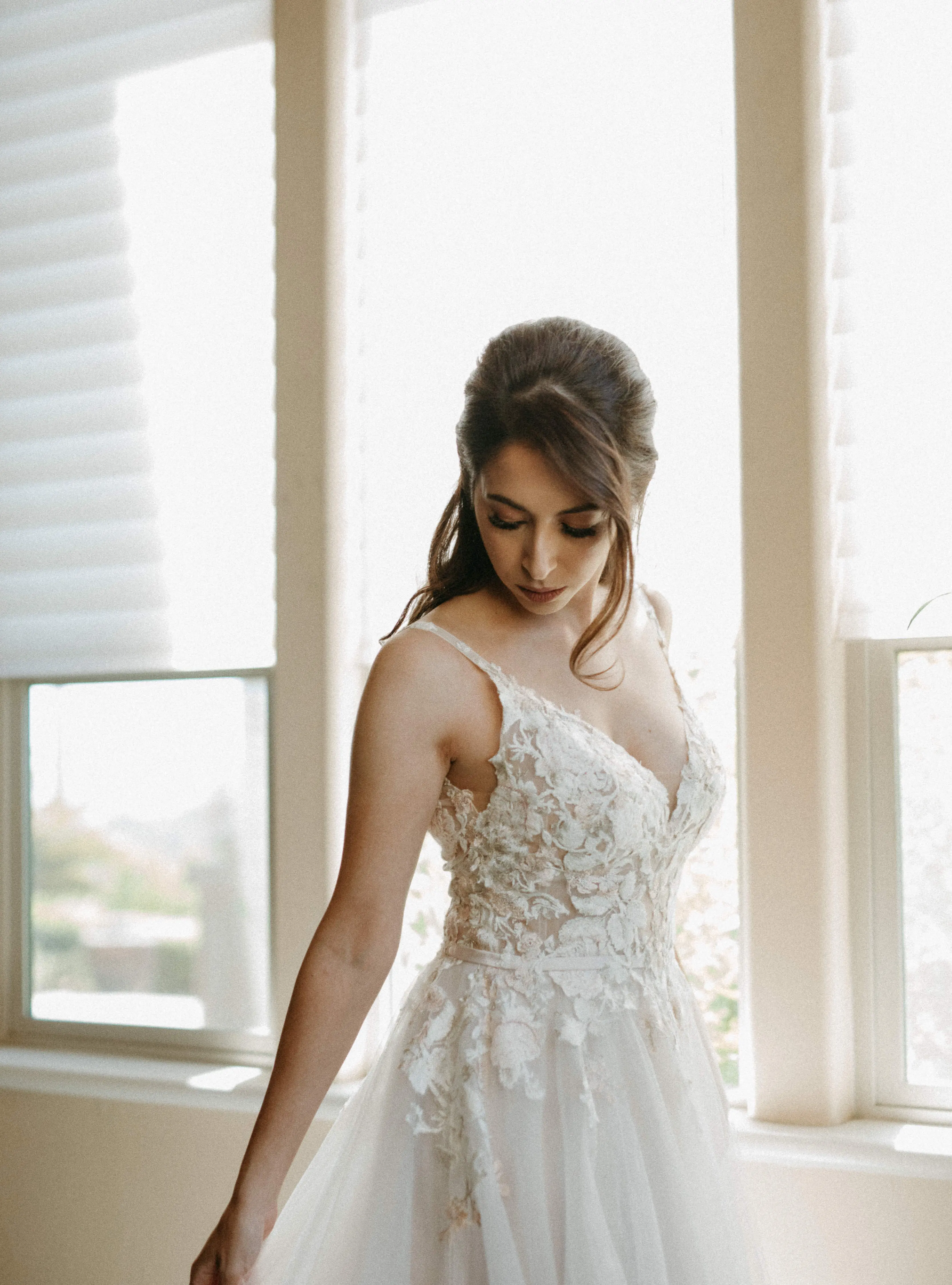 Bride in Magical A-Line Wedding Dress with Textured Illusion Motifs Called Minerva by Rebecca Ingram