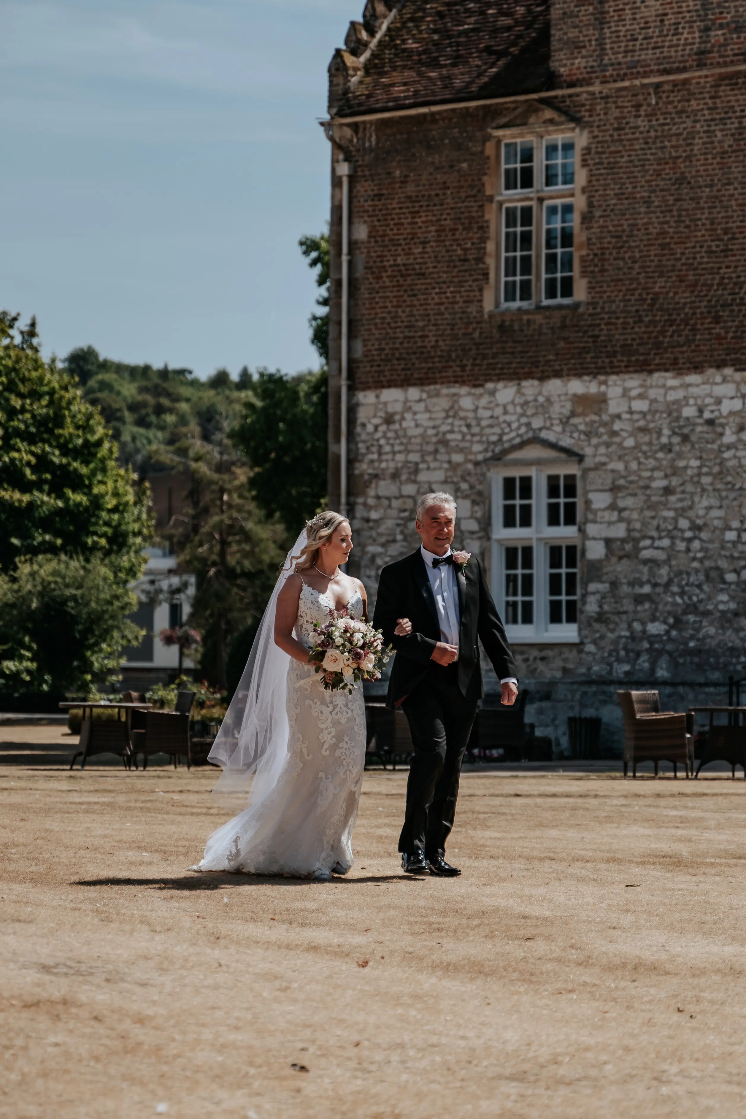 Real Bride in Lace Sheath Wedding Gown with Illusion Plunging Sweetheart Neckline Called Tuscany Lynette by Maggie Sottero