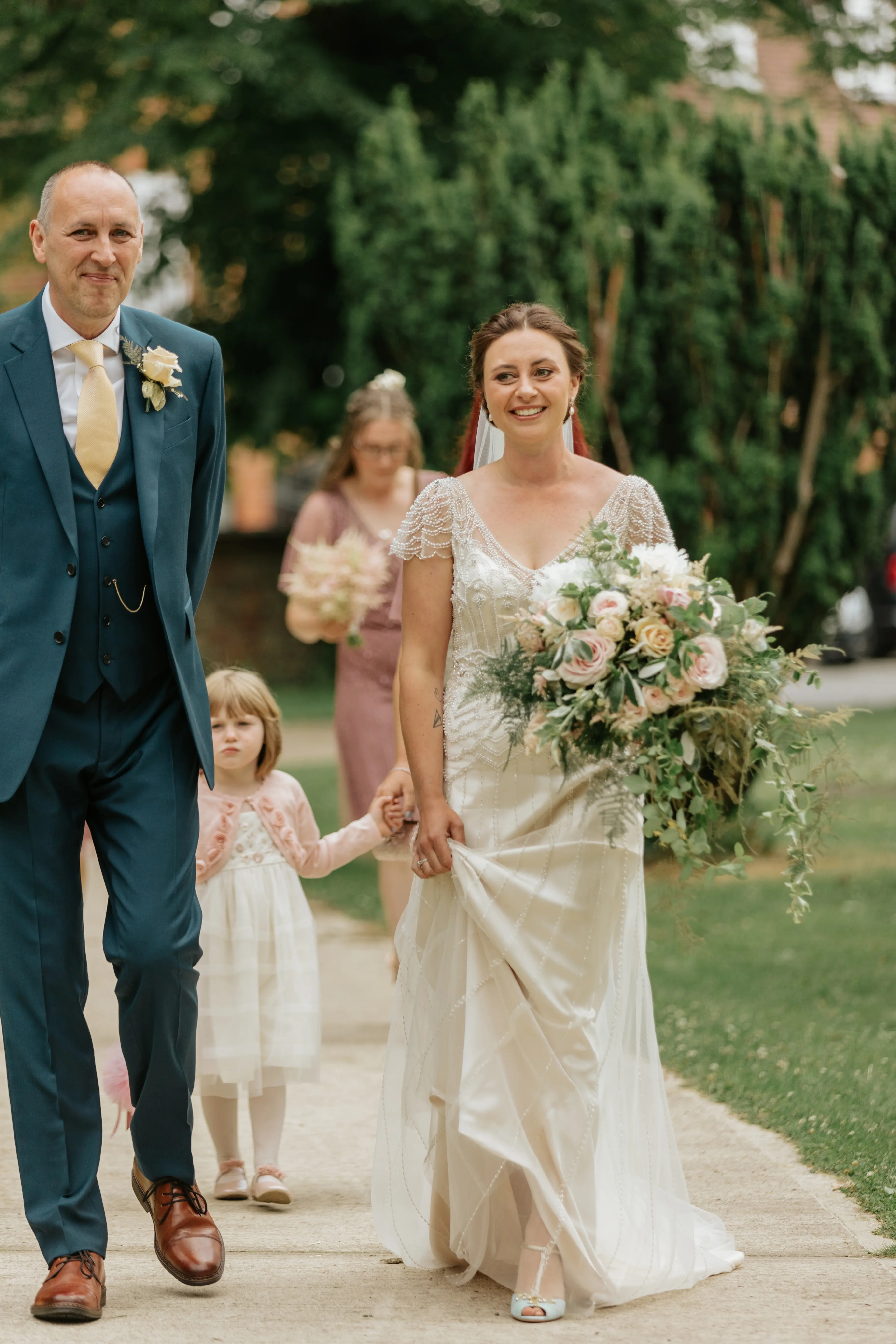Bride Wearing Ivory Satin Sheath Wedding Dress Ettia By Maggie Sottero