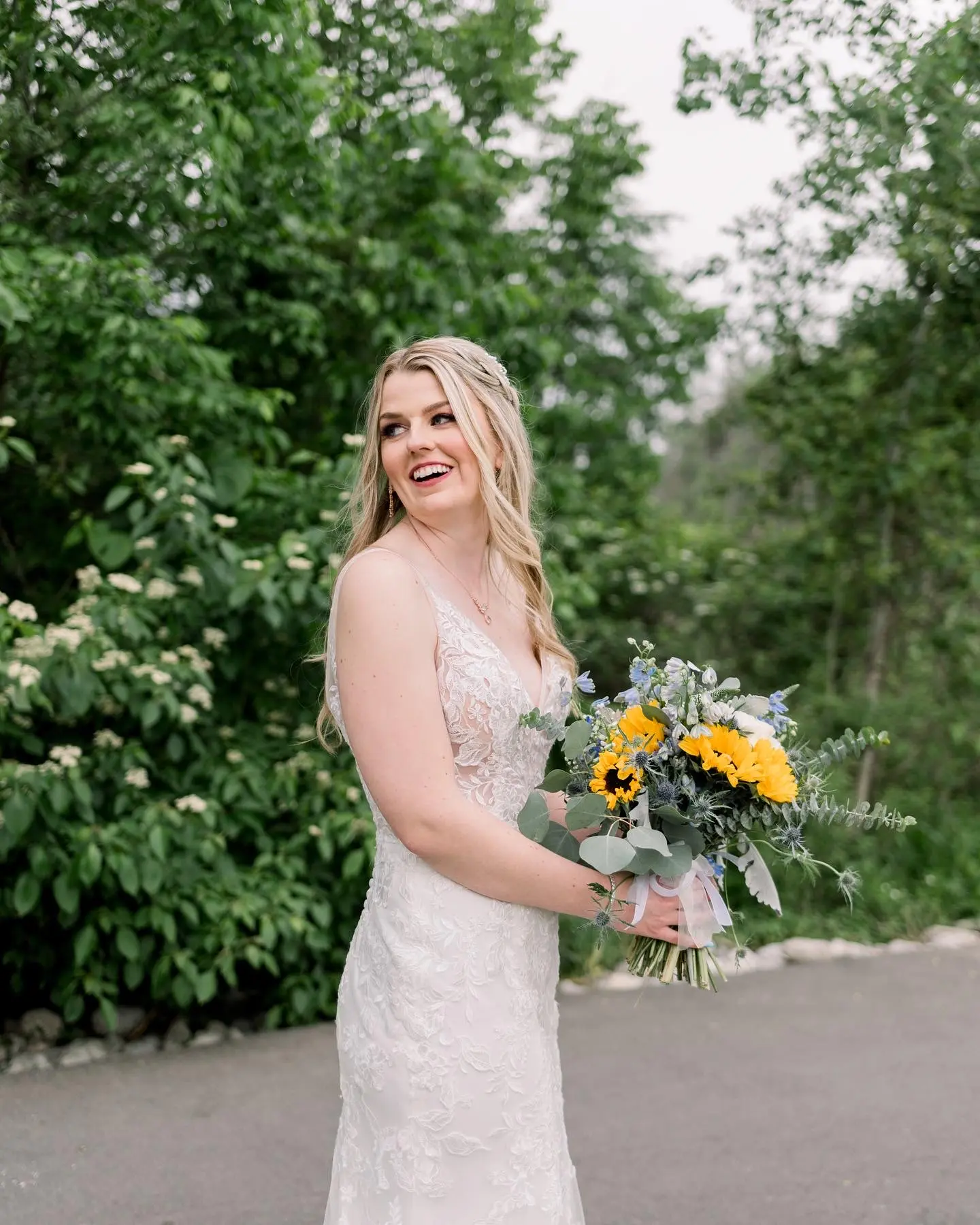 Bride in Floral Fit-and-Flare Wedding Dress Decked Out in Garden-Inspired Lace called Greenley by Maggie Sottero