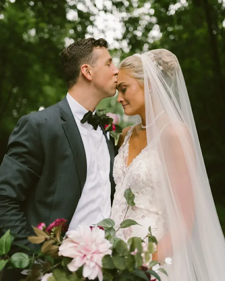 Groom With Bride Wearing Trumpet Wedding Dress With Colorful Floral Lace Motifs Kenleigh By Sottero And Midgley